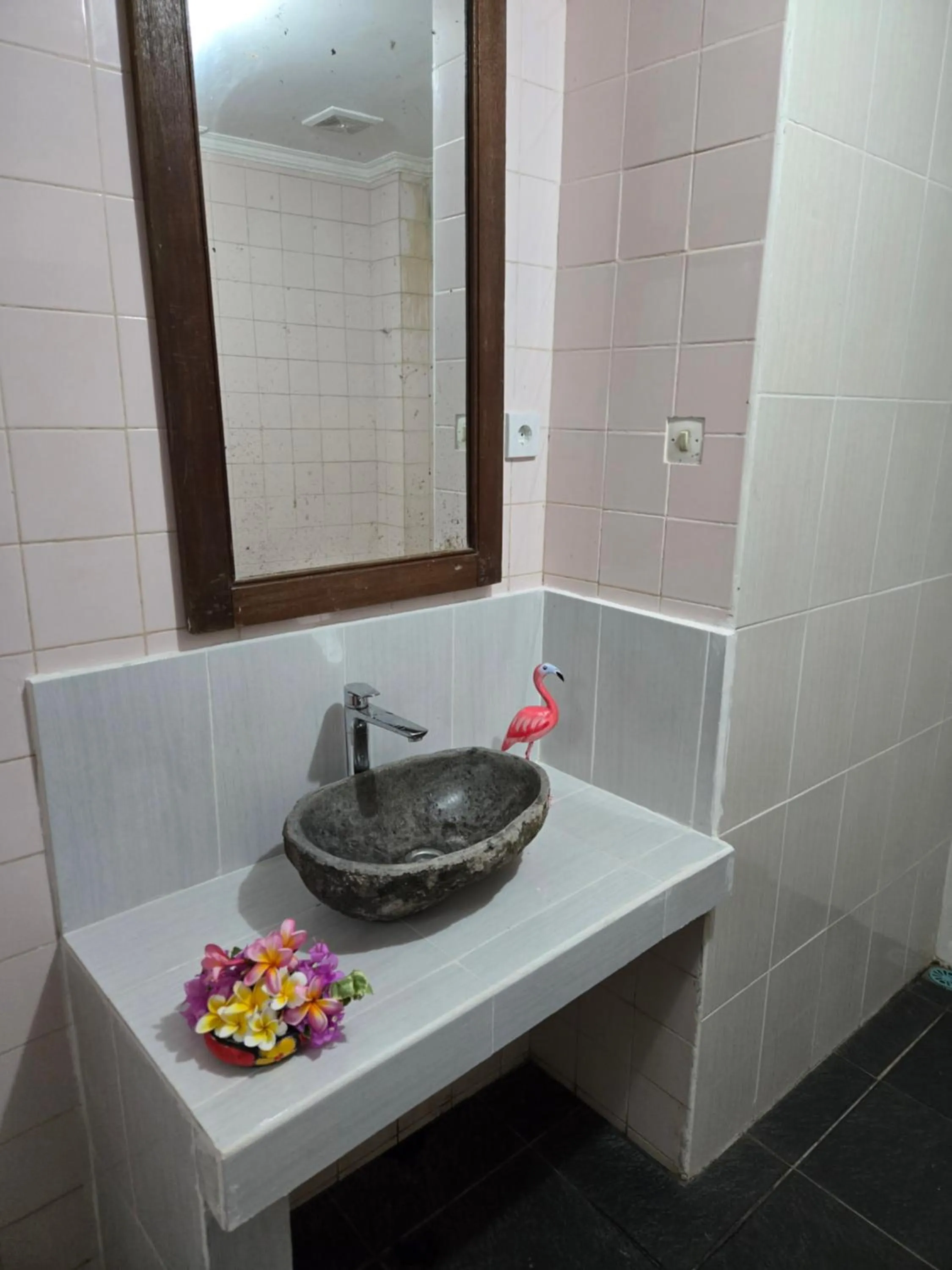 Bathroom in Berlian Inn Kuta Beach