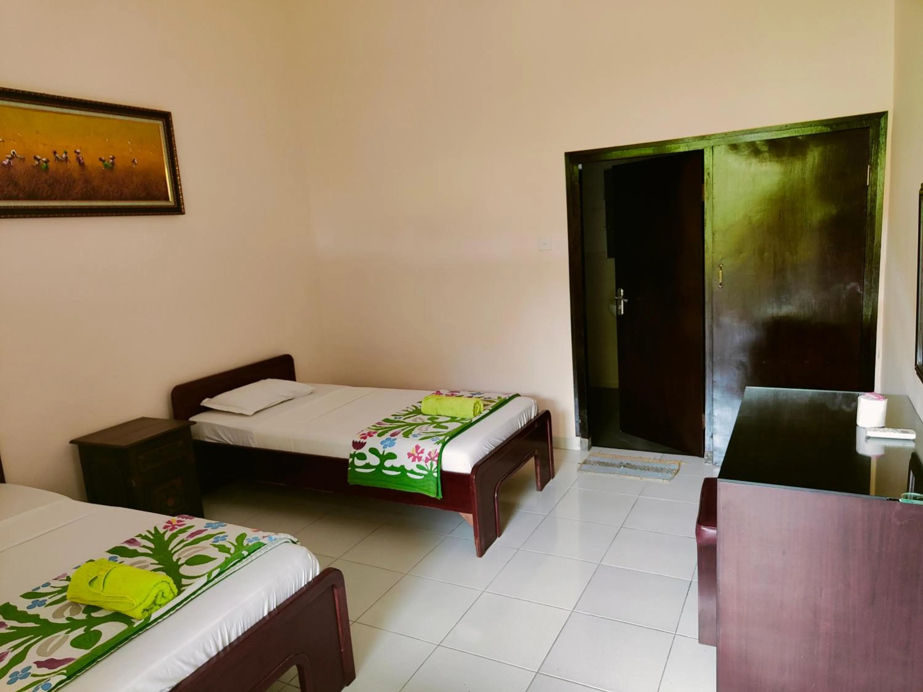 Bed in Berlian Inn Kuta Beach