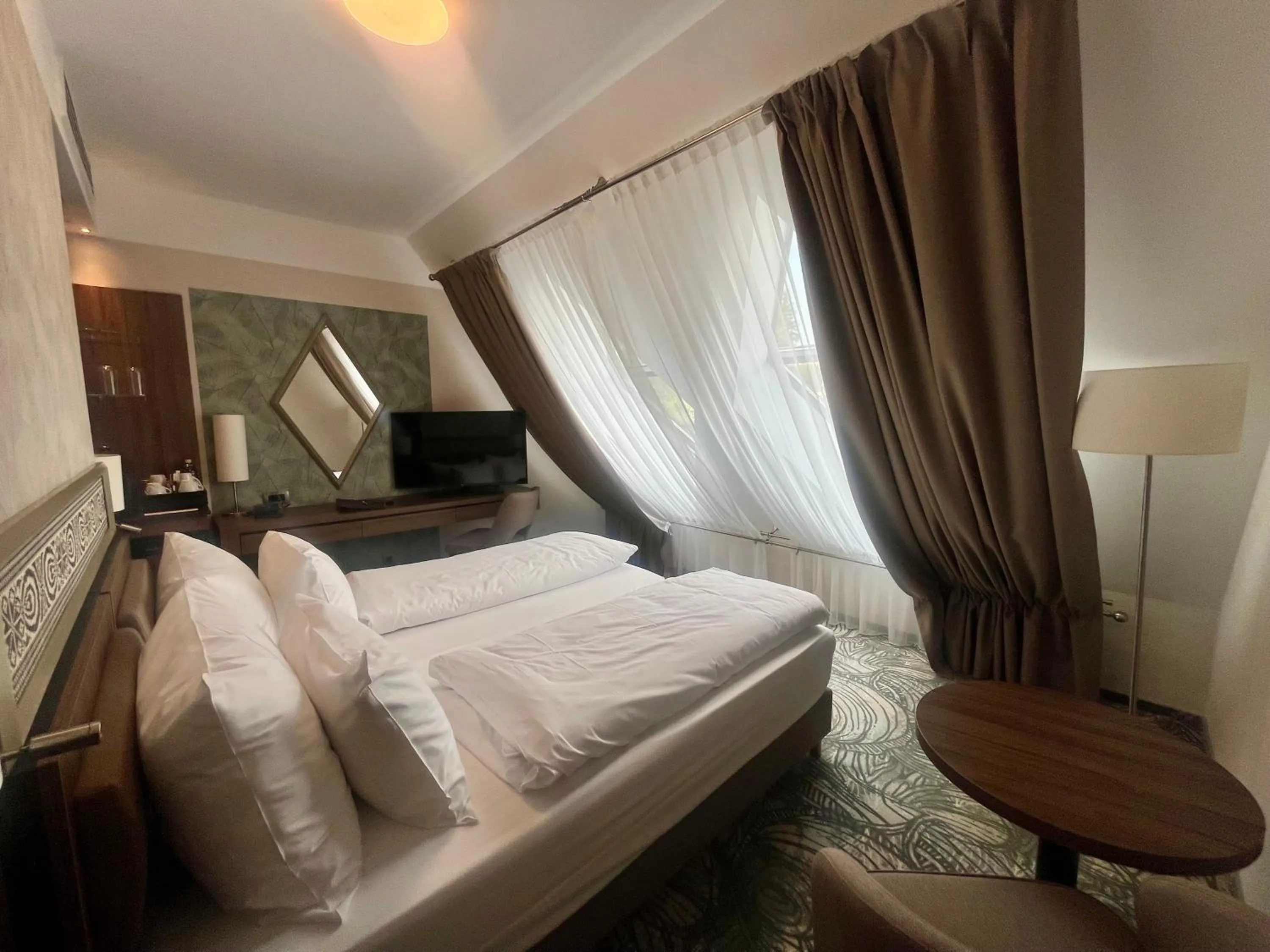 Bed in HOTEL CRYSTAL WELLNESS & SPA superior