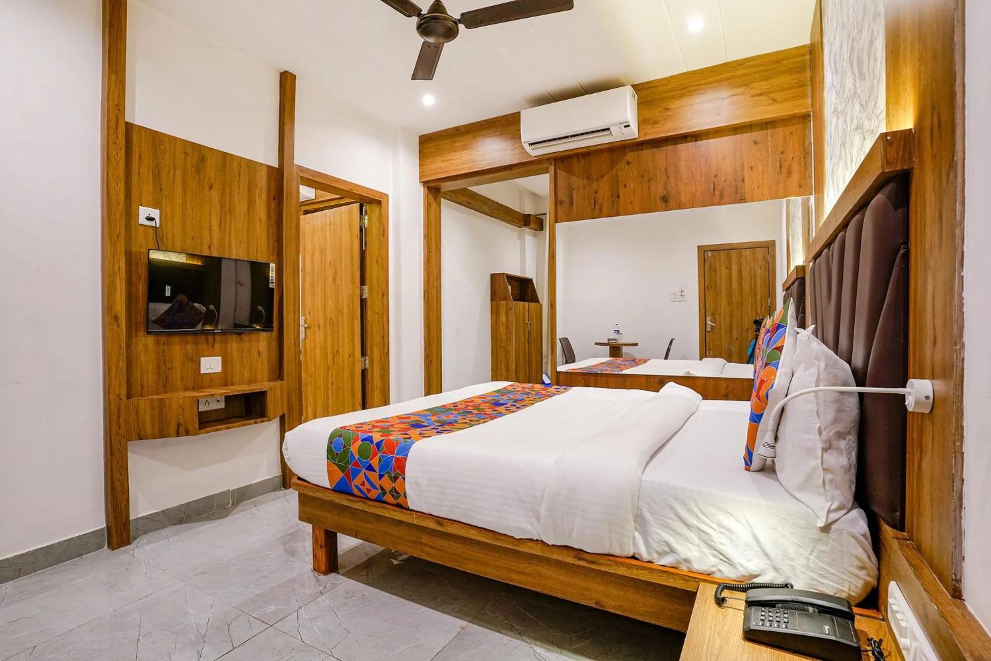 Bedroom in FabHotel Grand Residency