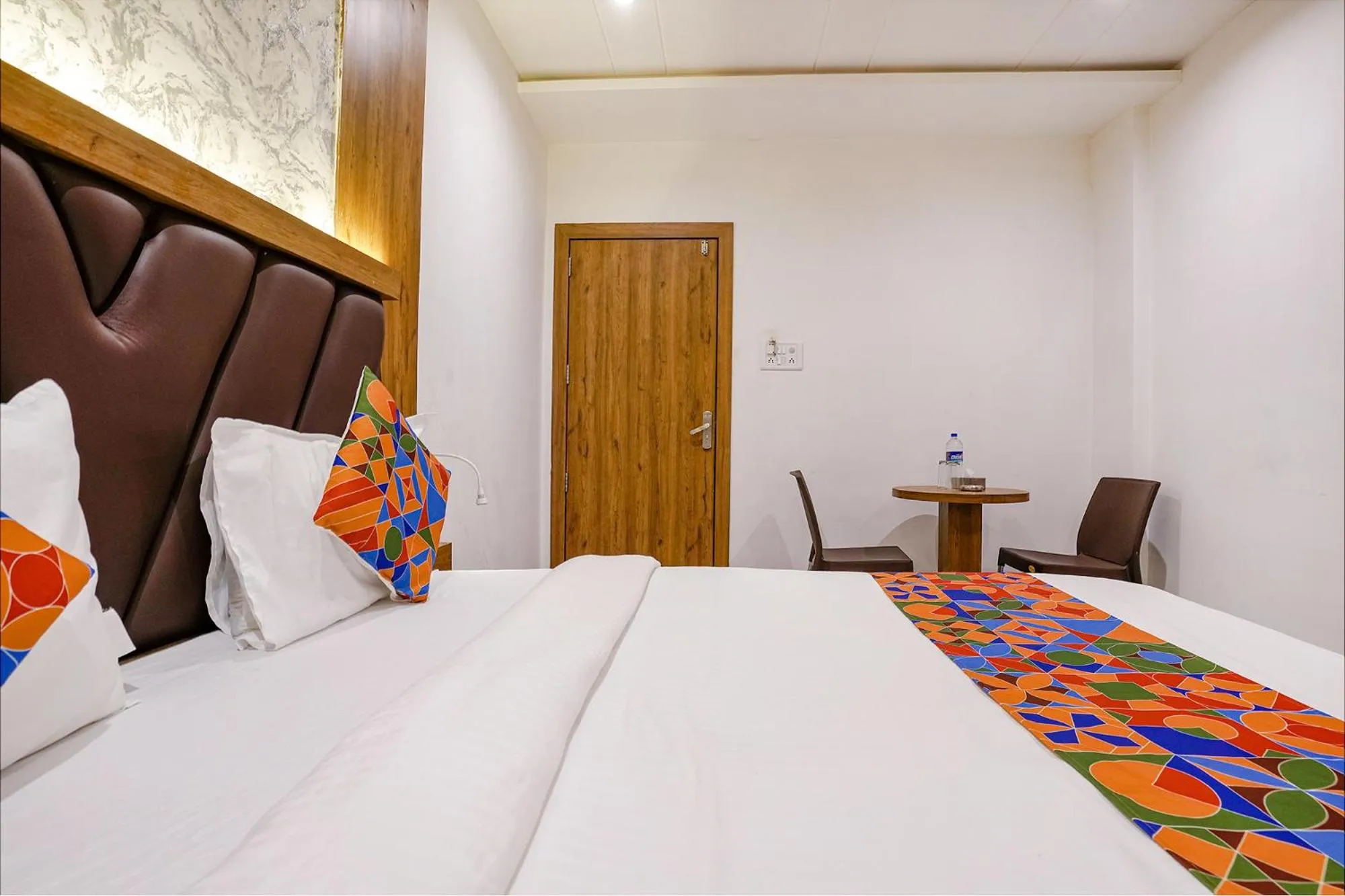 Bed in FabHotel Grand Residency