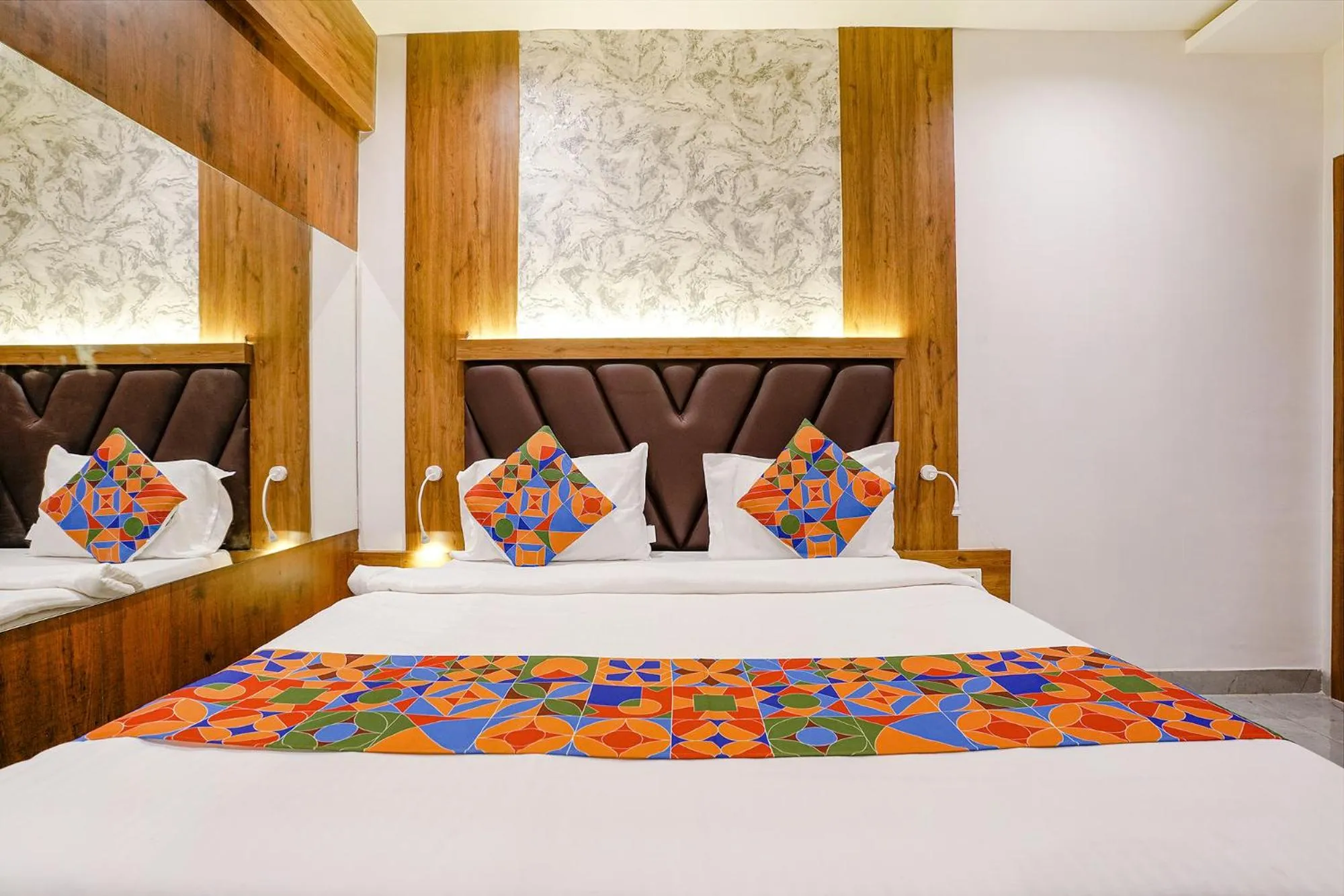 Bed in FabHotel Grand Residency
