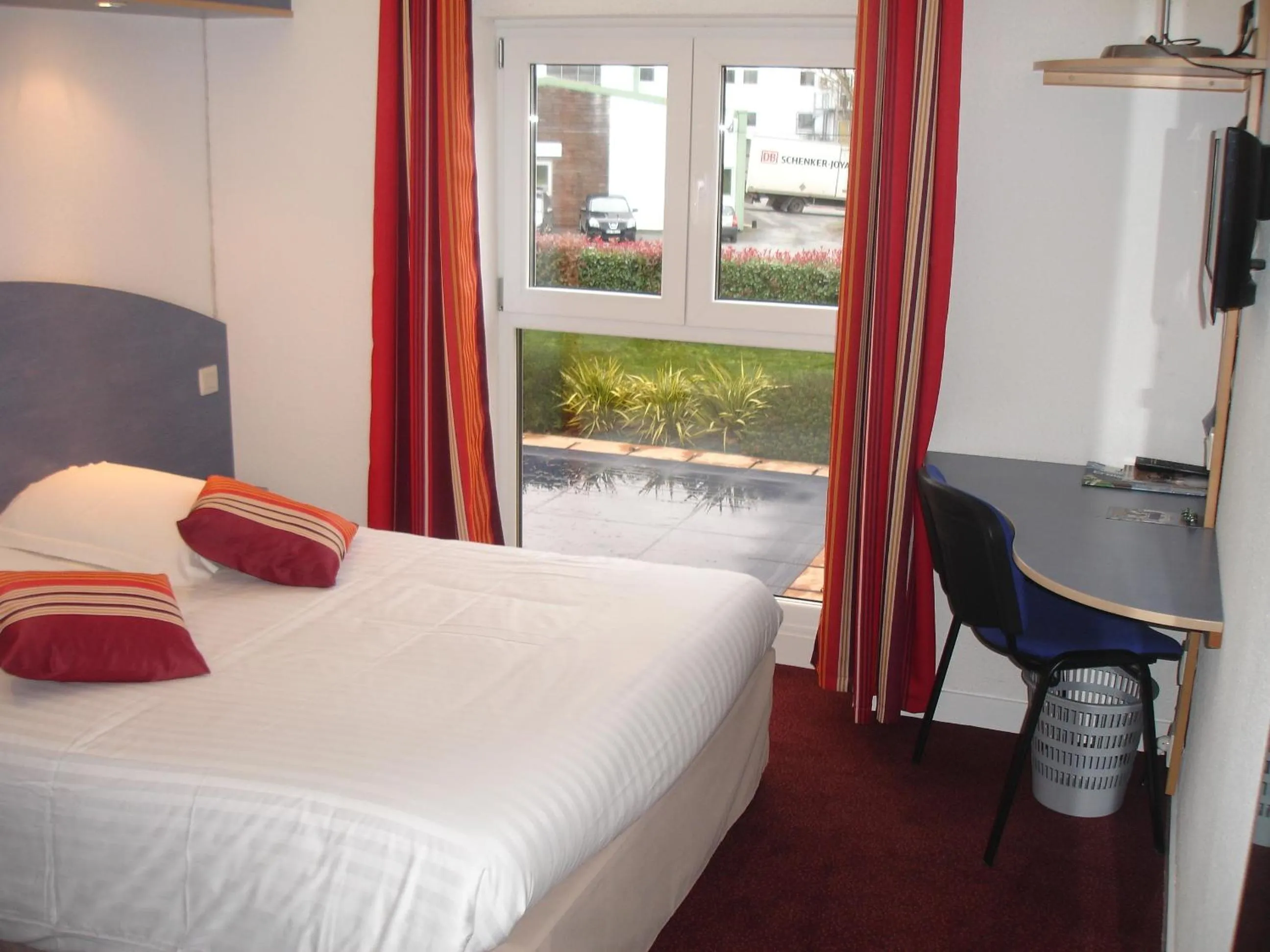 Photo of the whole room, Bed in Agape Hotel Niort- Bessines