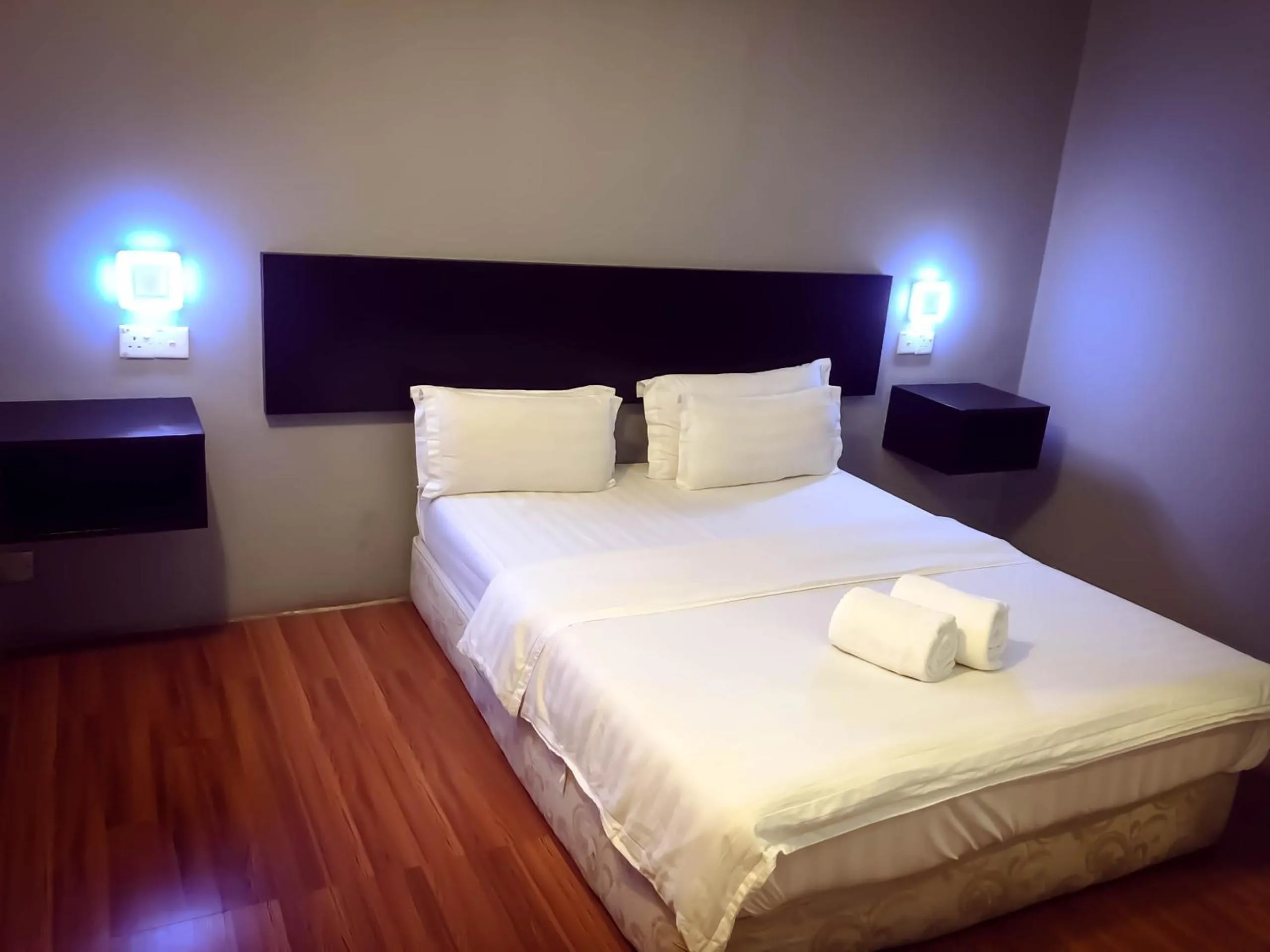 Bed in De Choice Hotel Tawau