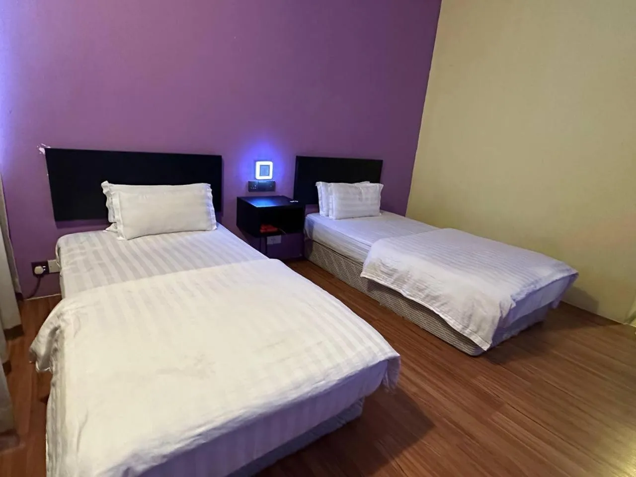 Bed in De Choice Hotel Tawau