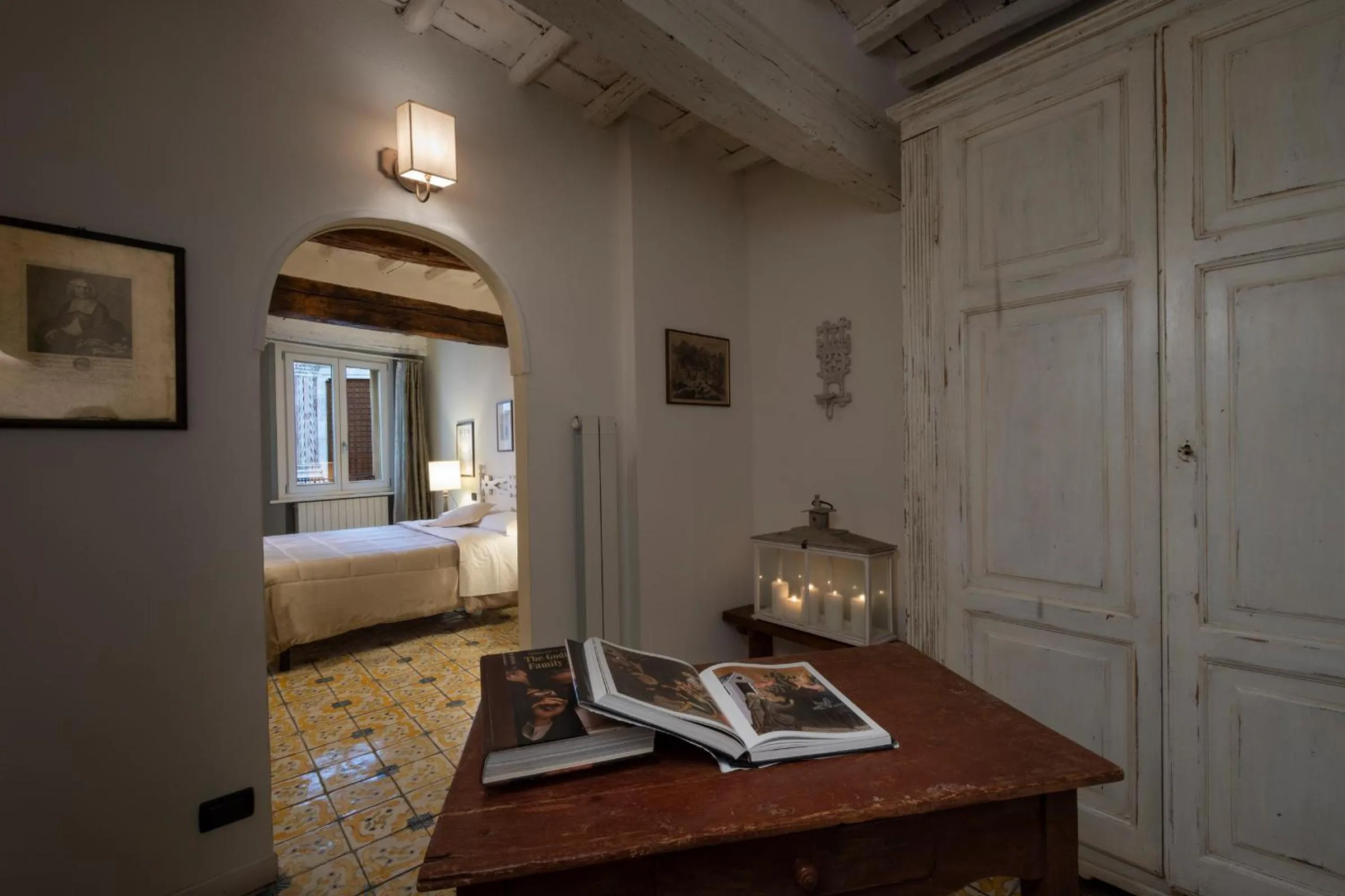 Living room, Bed in Il Battistero Siena Residenza d'Epoca