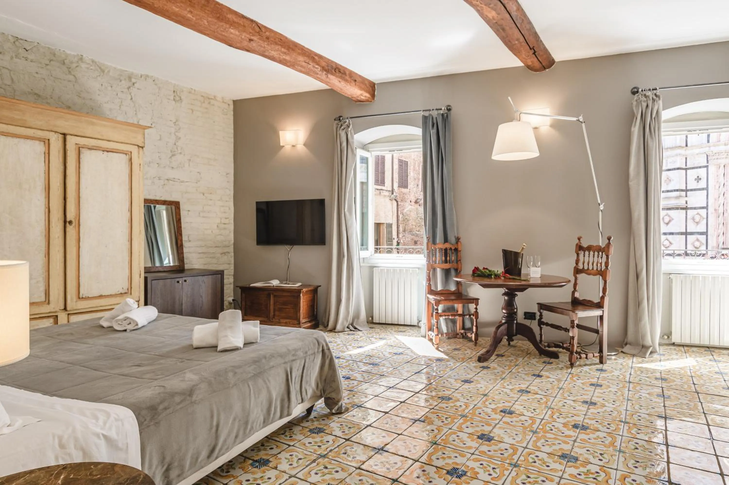 Bed in Il Battistero Siena Residenza d'Epoca