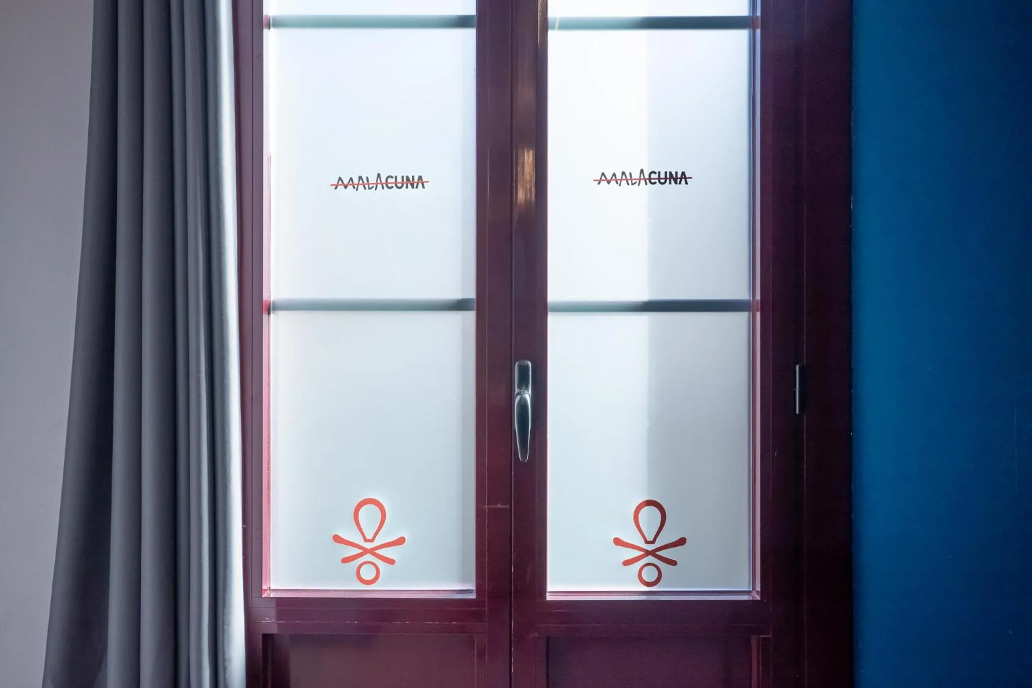 Property logo or sign in Malacuna Barcelona