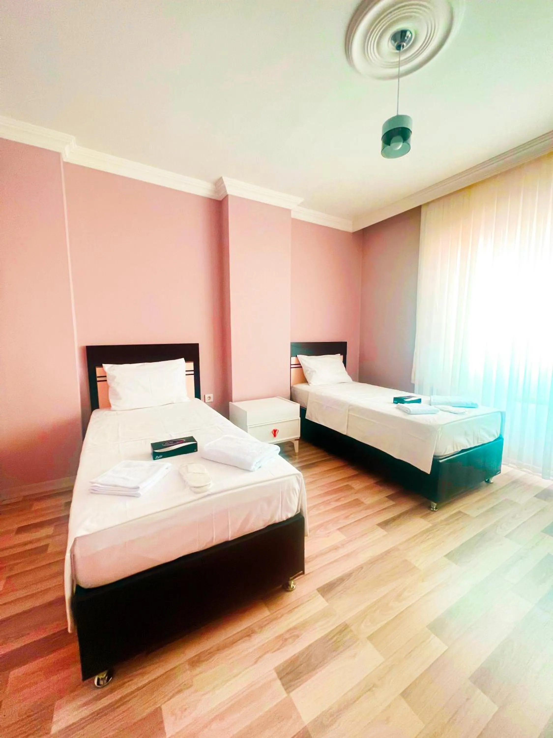 Bed in Seabird Suite Apart Hotel