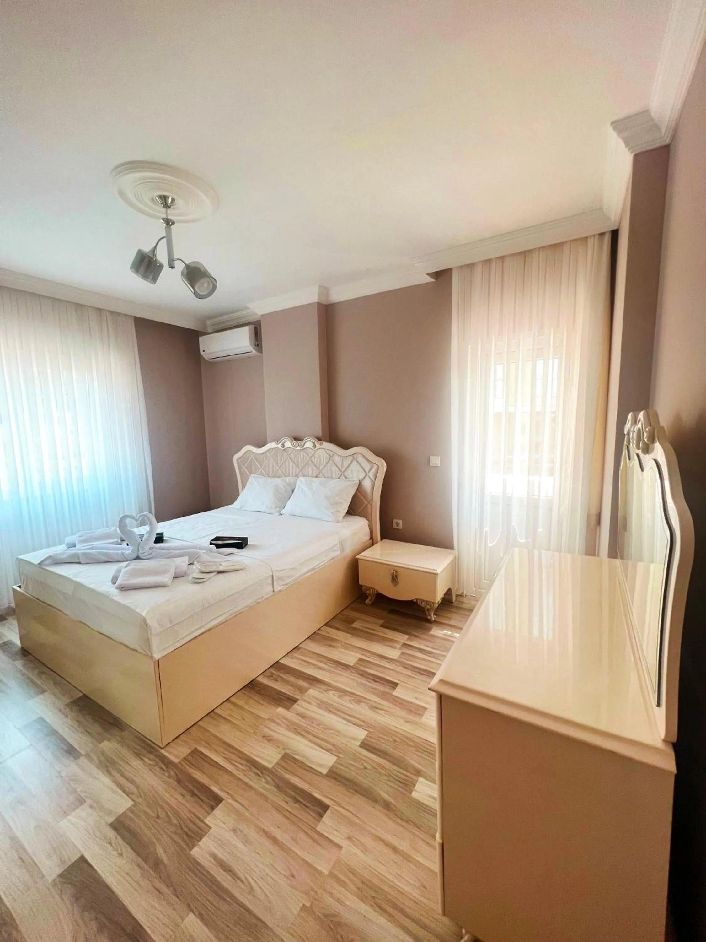 Bed in Seabird Suite Apart Hotel