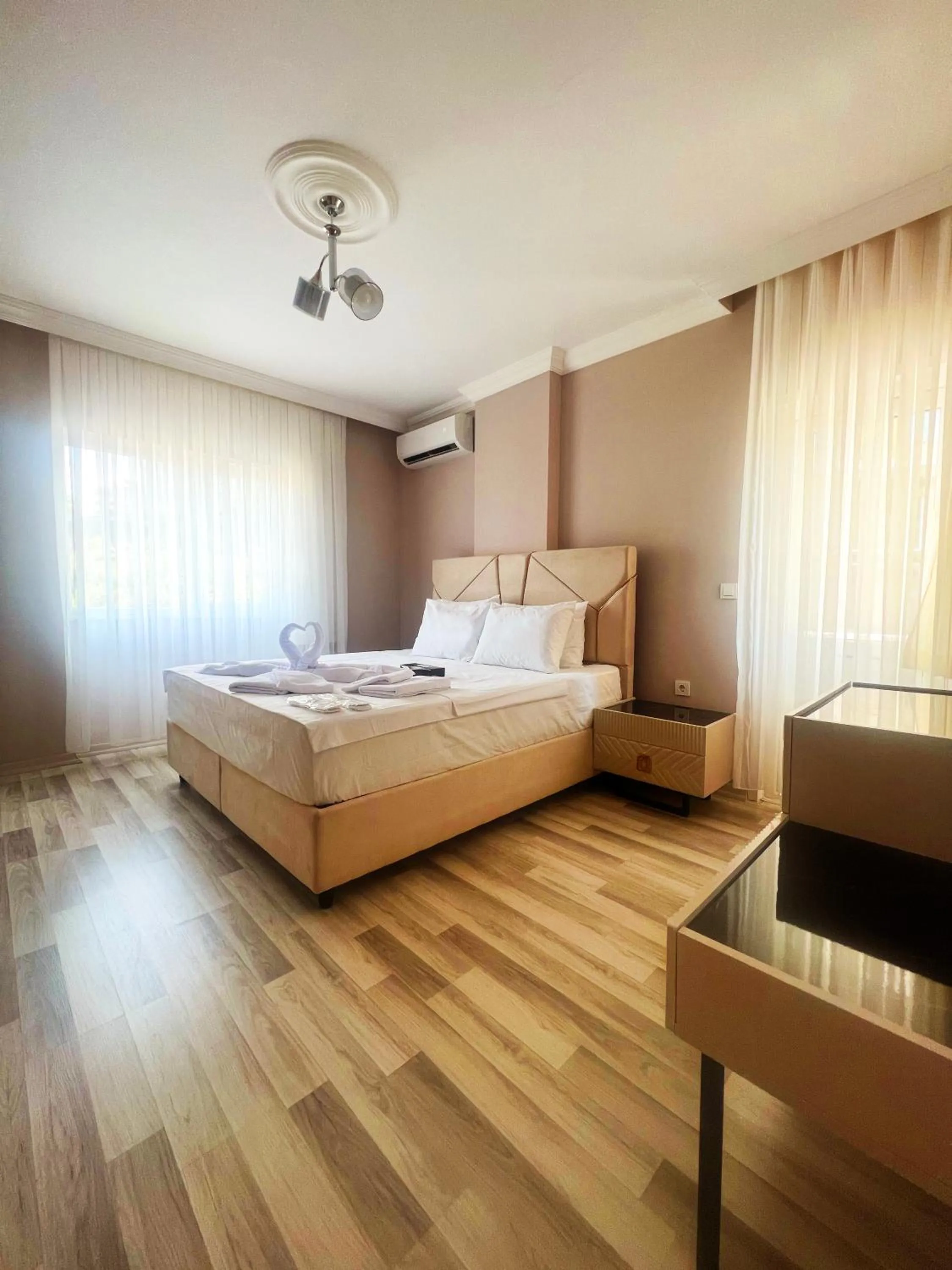 Bed in Seabird Suite Apart Hotel