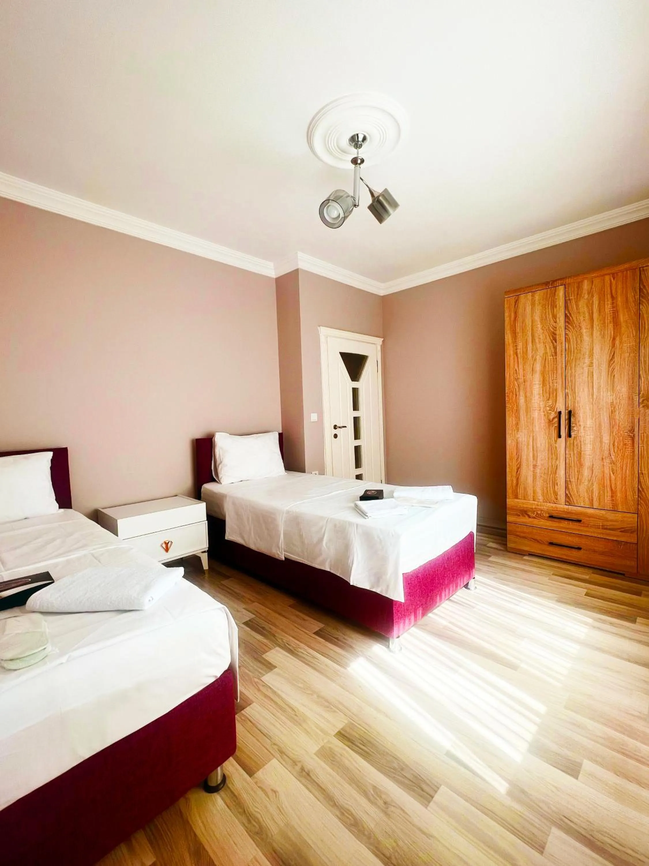 Bed in Seabird Suite Apart Hotel