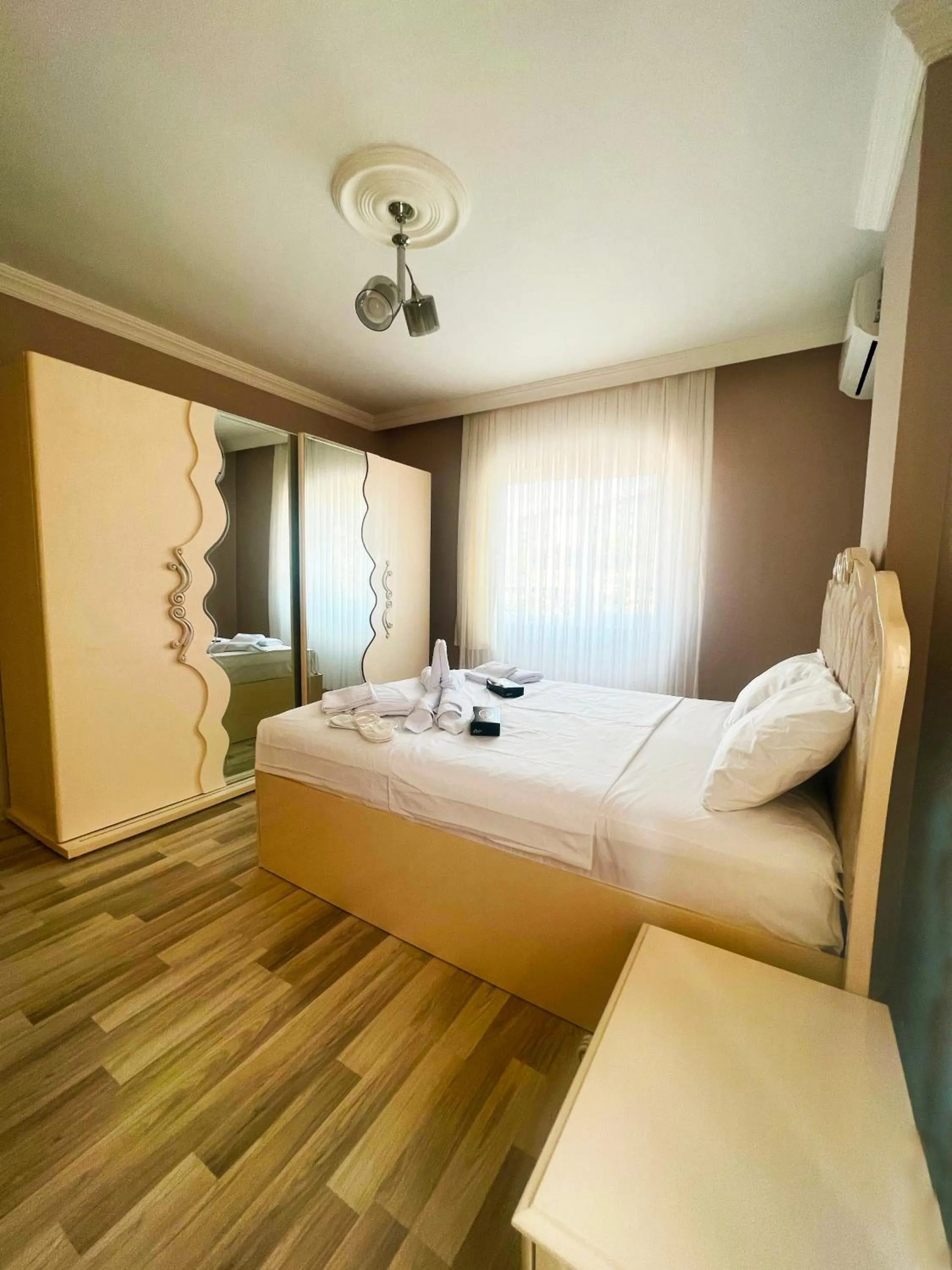 Bed in Seabird Suite Apart Hotel