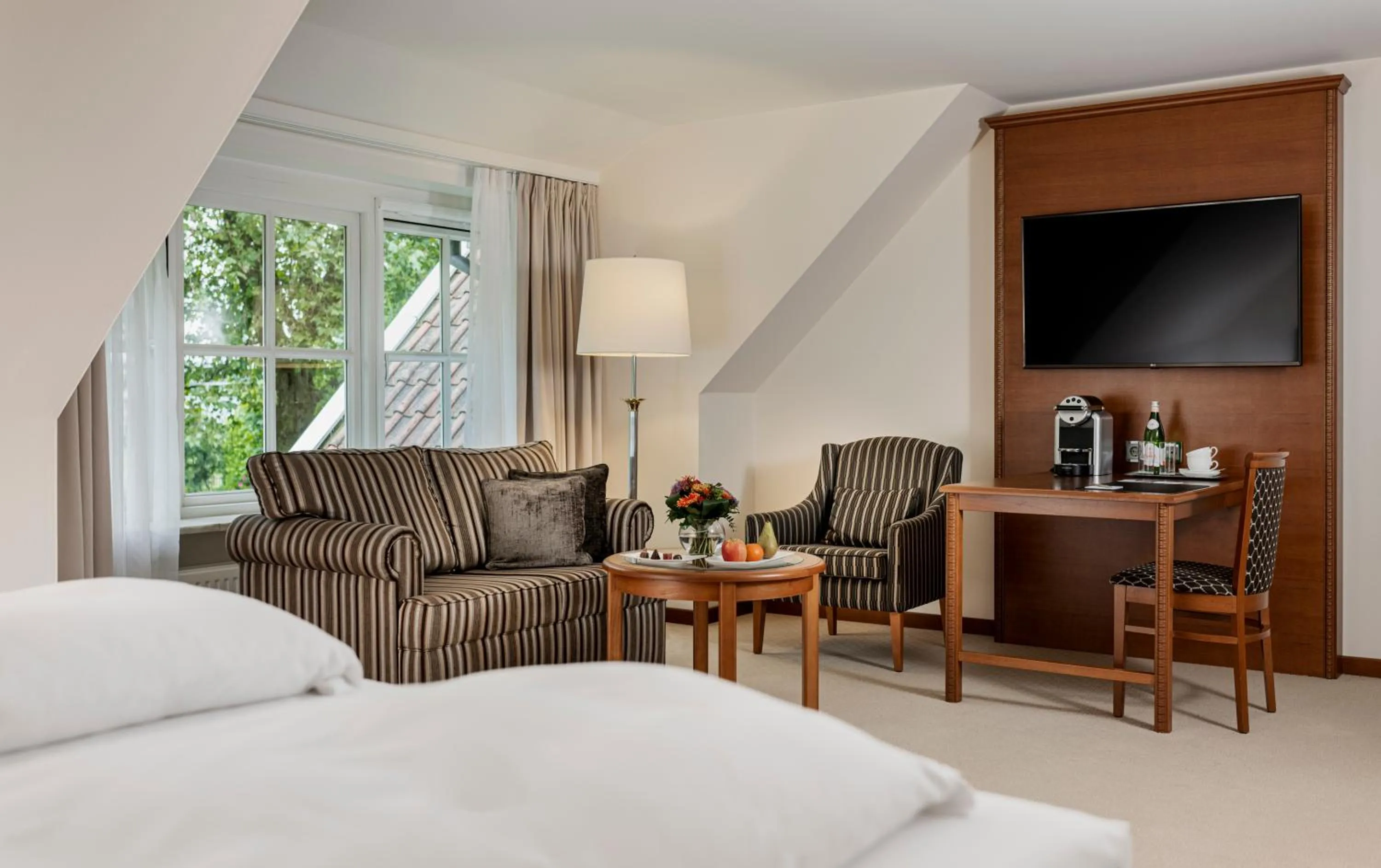 Seating area, Bed in Fletcher Parkhotel De Wiemsel