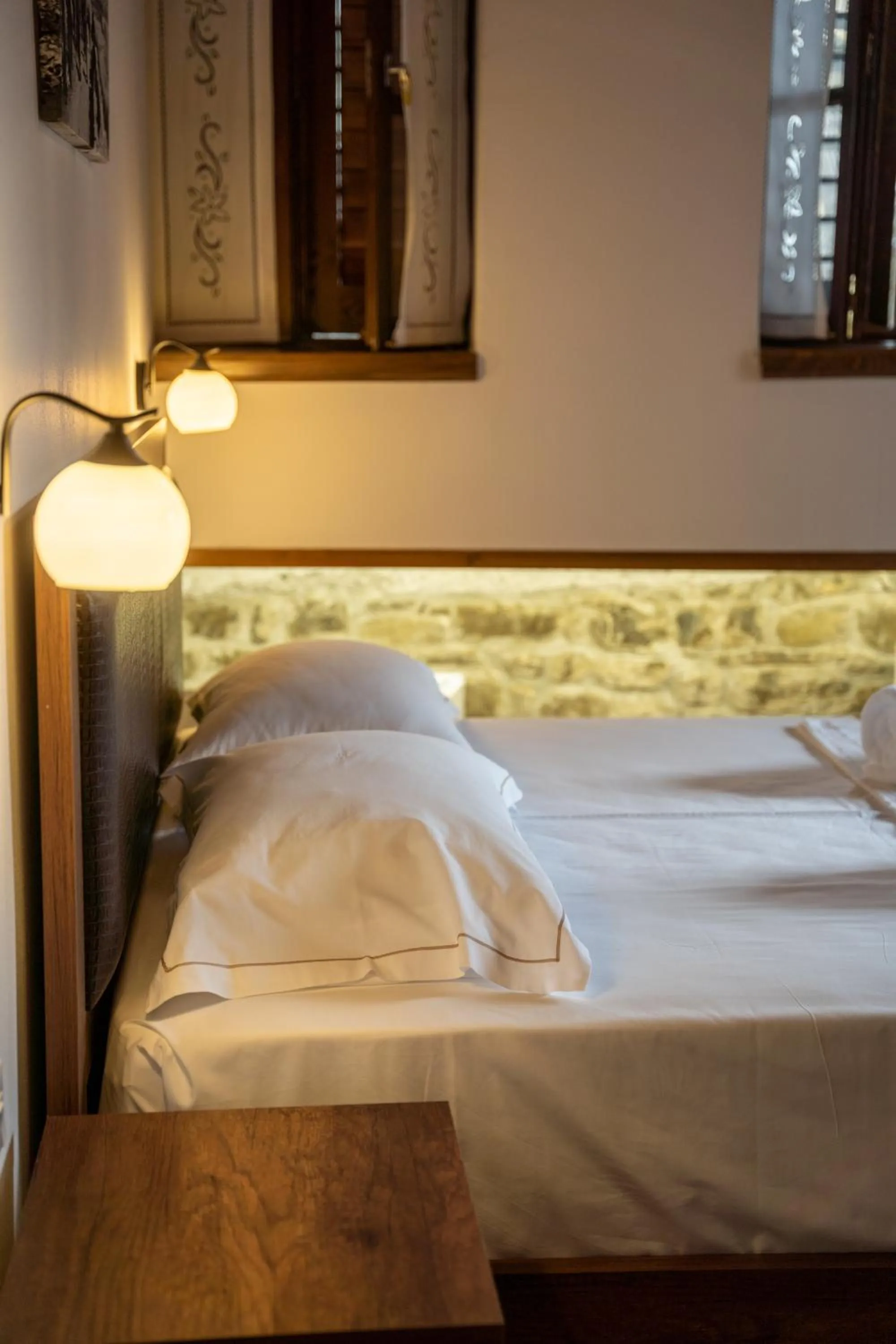 Bed in Hotel Kapllani