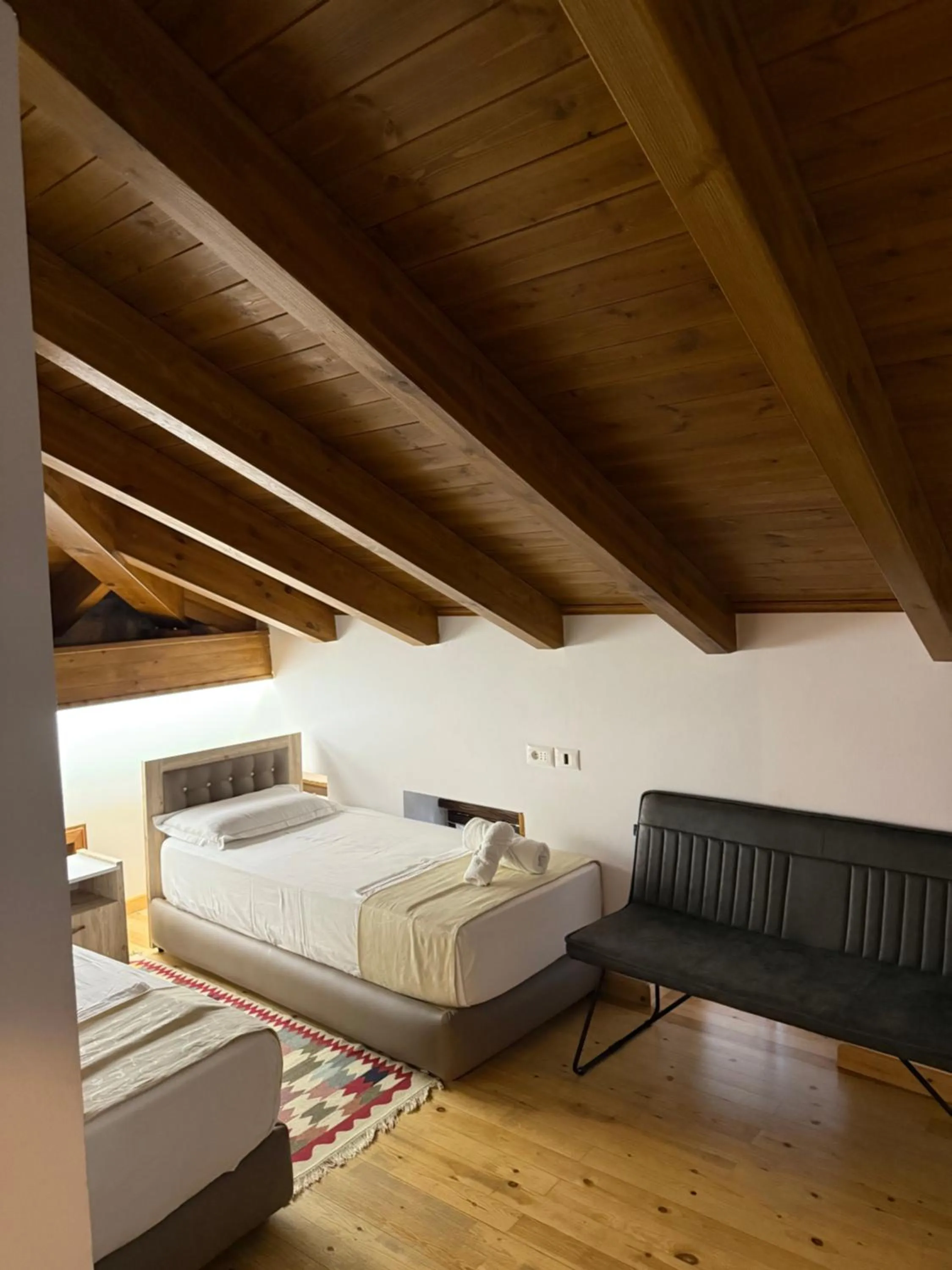 Bed in Hotel Kapllani