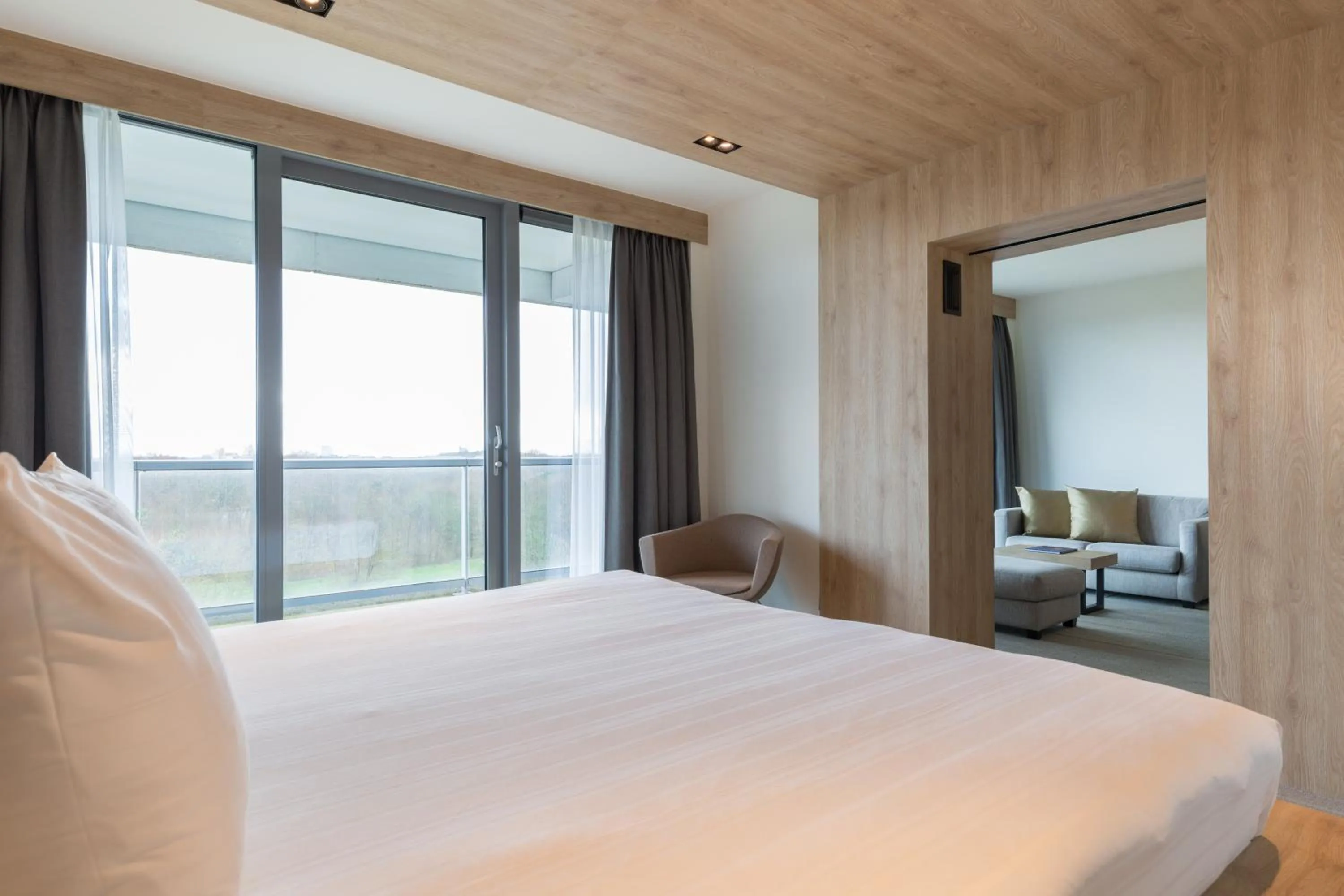 Bedroom, Bed in Leonardo Royal Hotel Den Haag Promenade