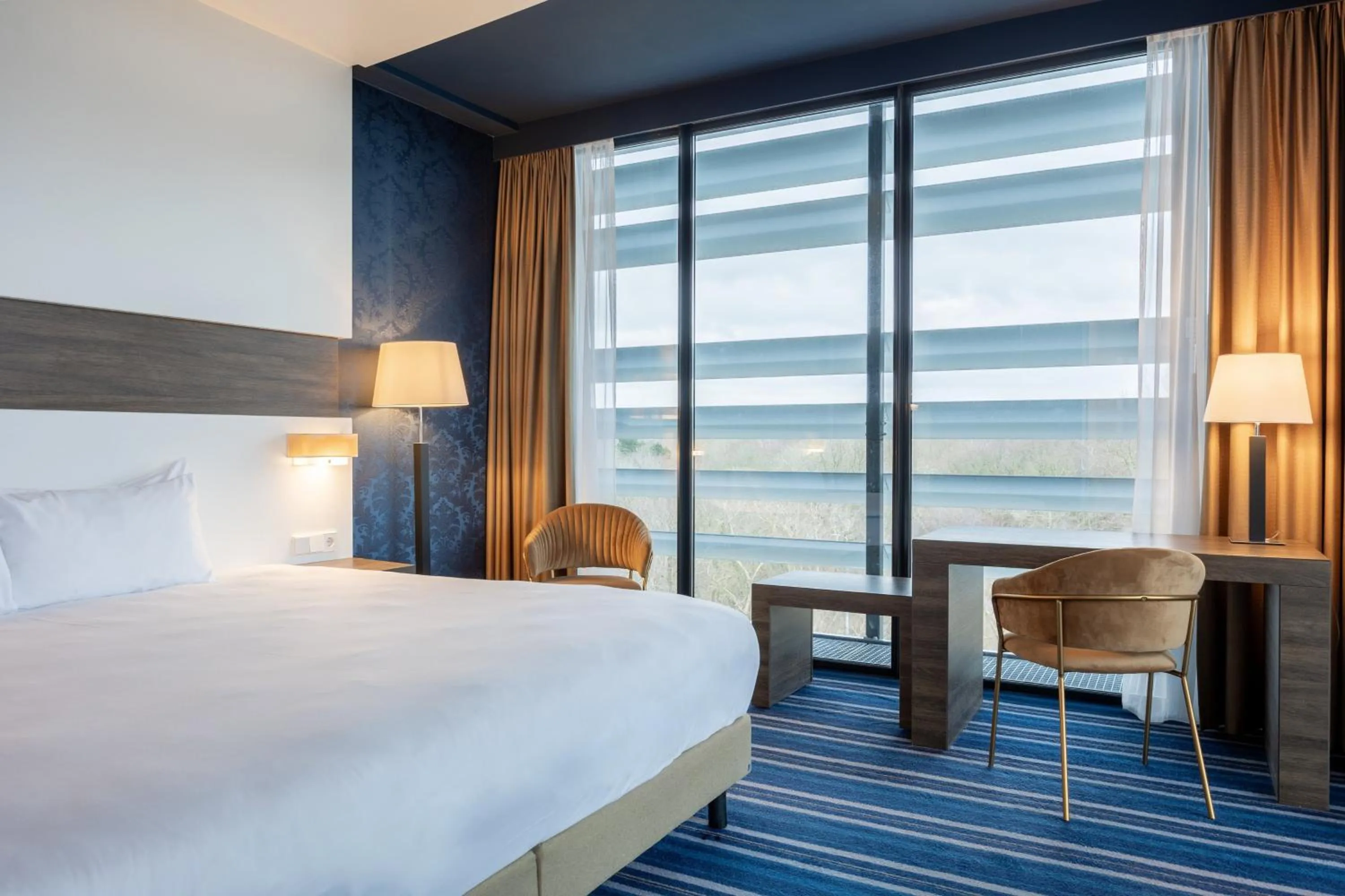 Photo of the whole room, Bed in Leonardo Royal Hotel Den Haag Promenade