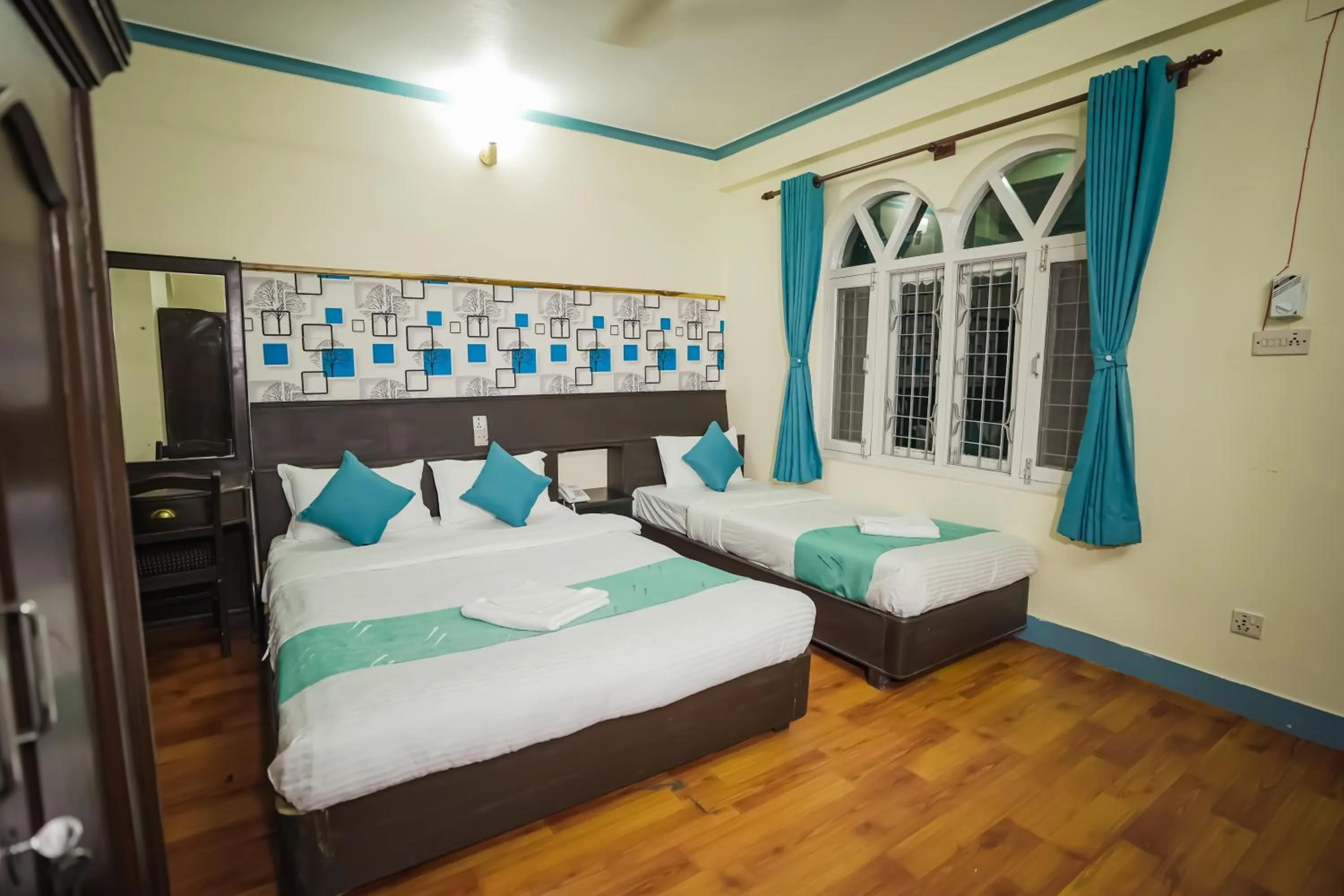 Bed in Himalayan Guest House