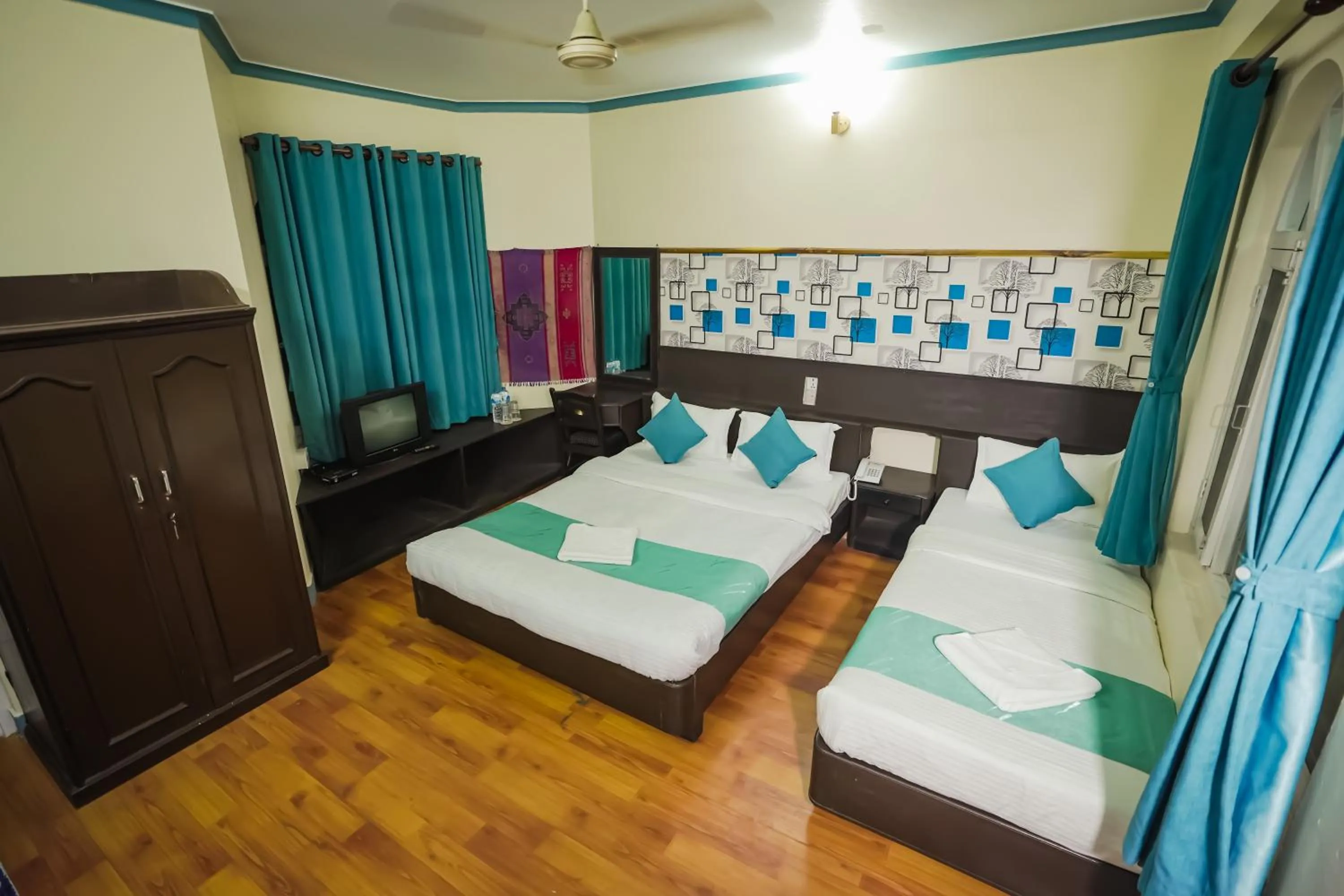 Photo of the whole room, Bed in Himalayan Guest House