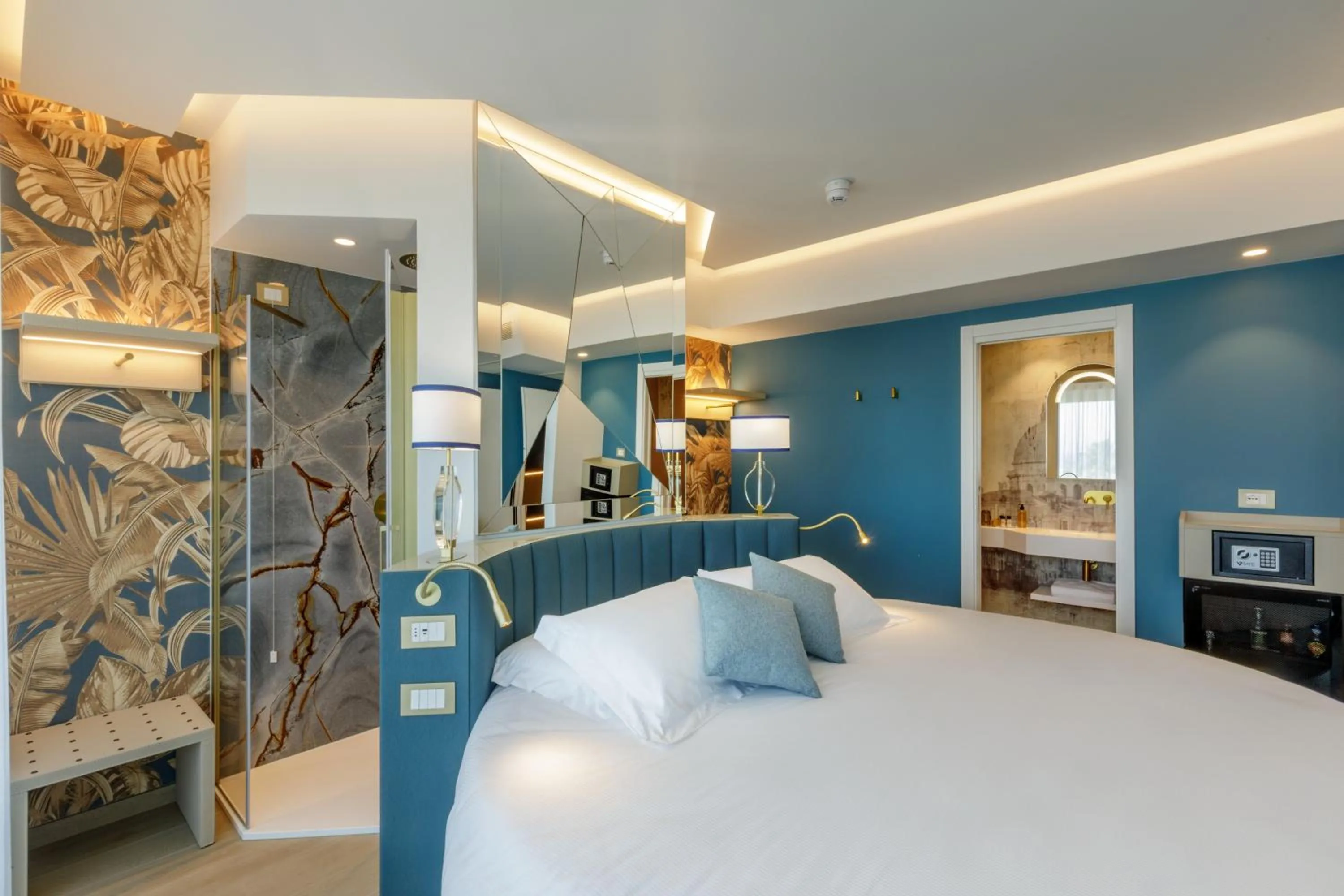 Bed in Ambasciatori Suite Hotel