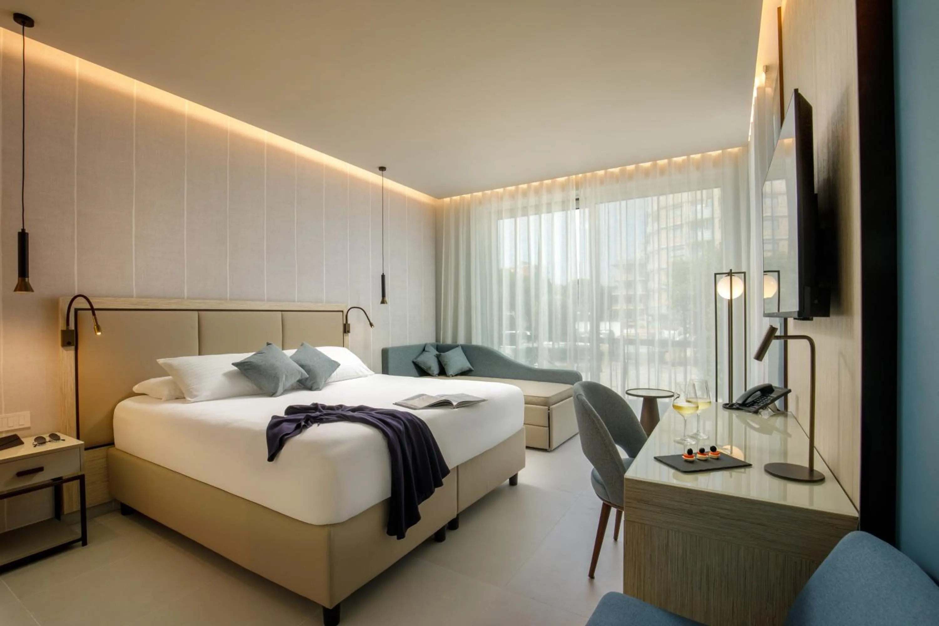 Bed in Ambasciatori Suite Hotel