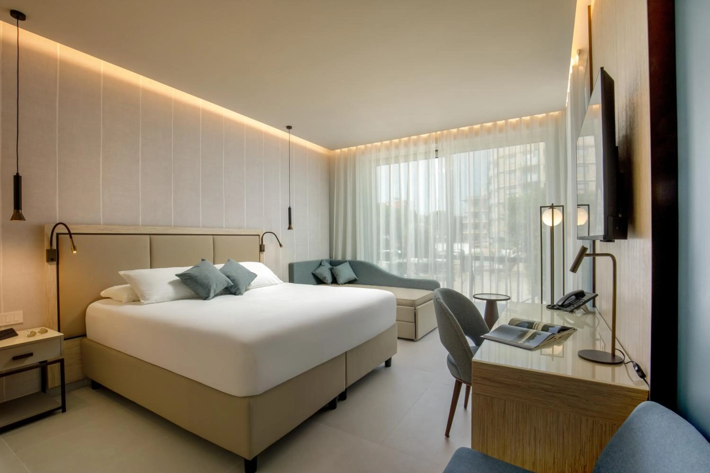 Bed in Ambasciatori Suite Hotel