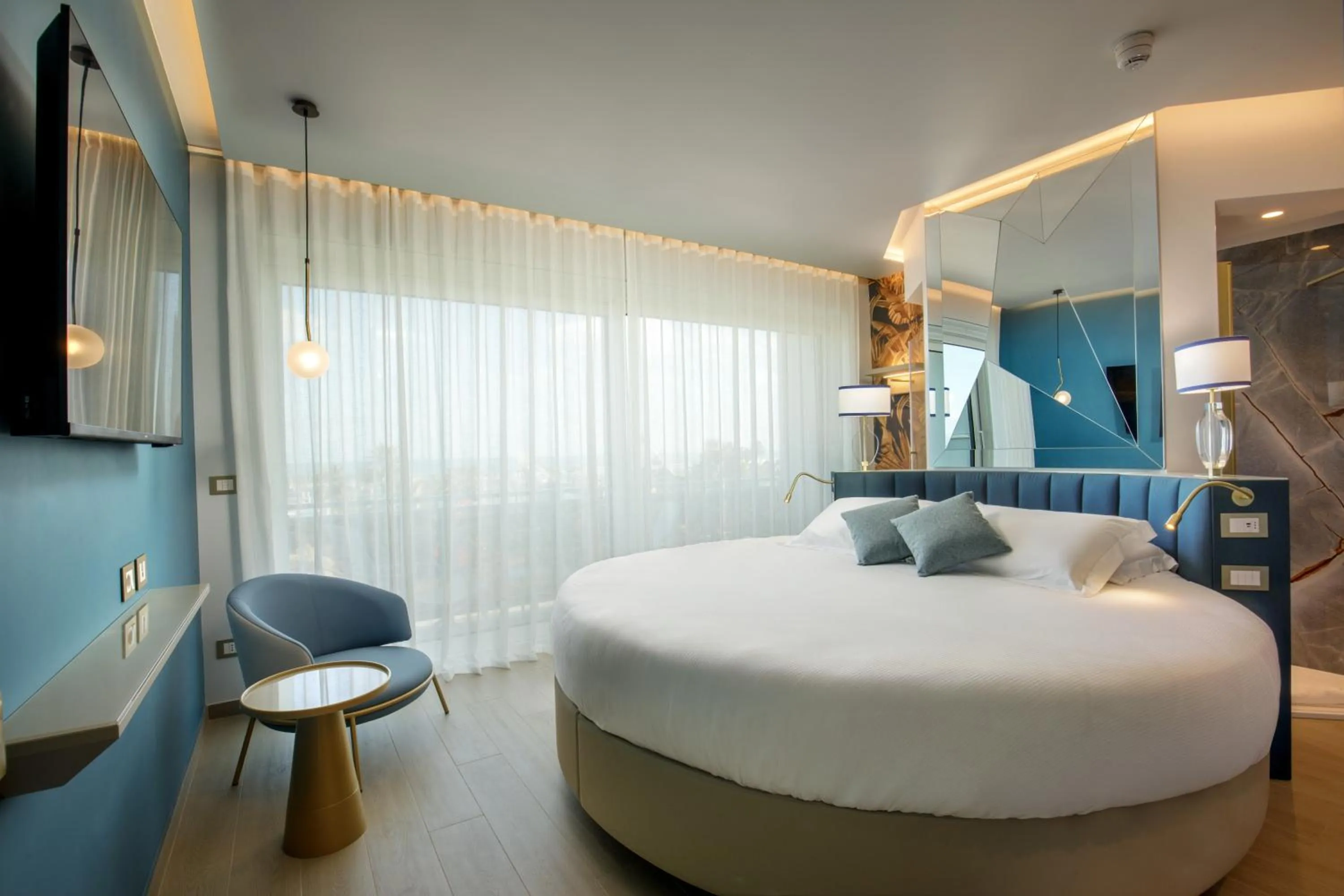 Bed in Ambasciatori Suite Hotel