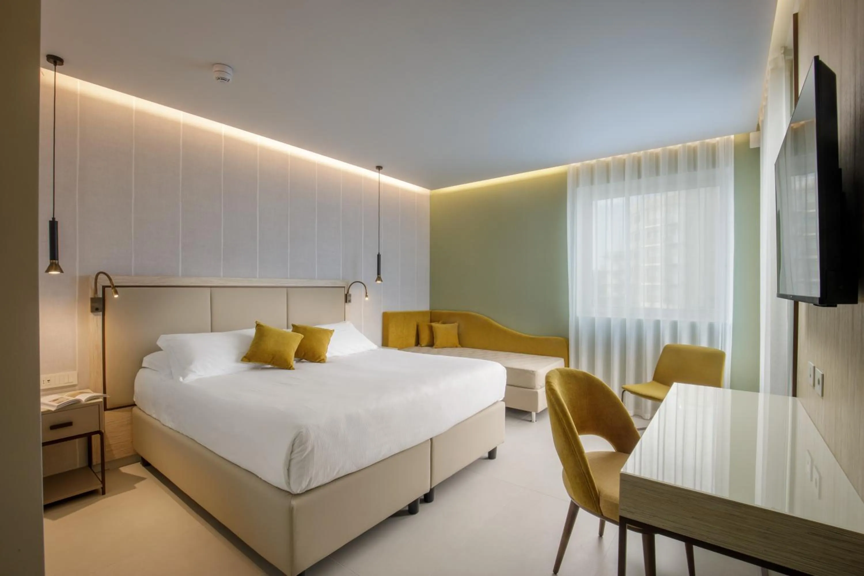 Bed in Ambasciatori Suite Hotel