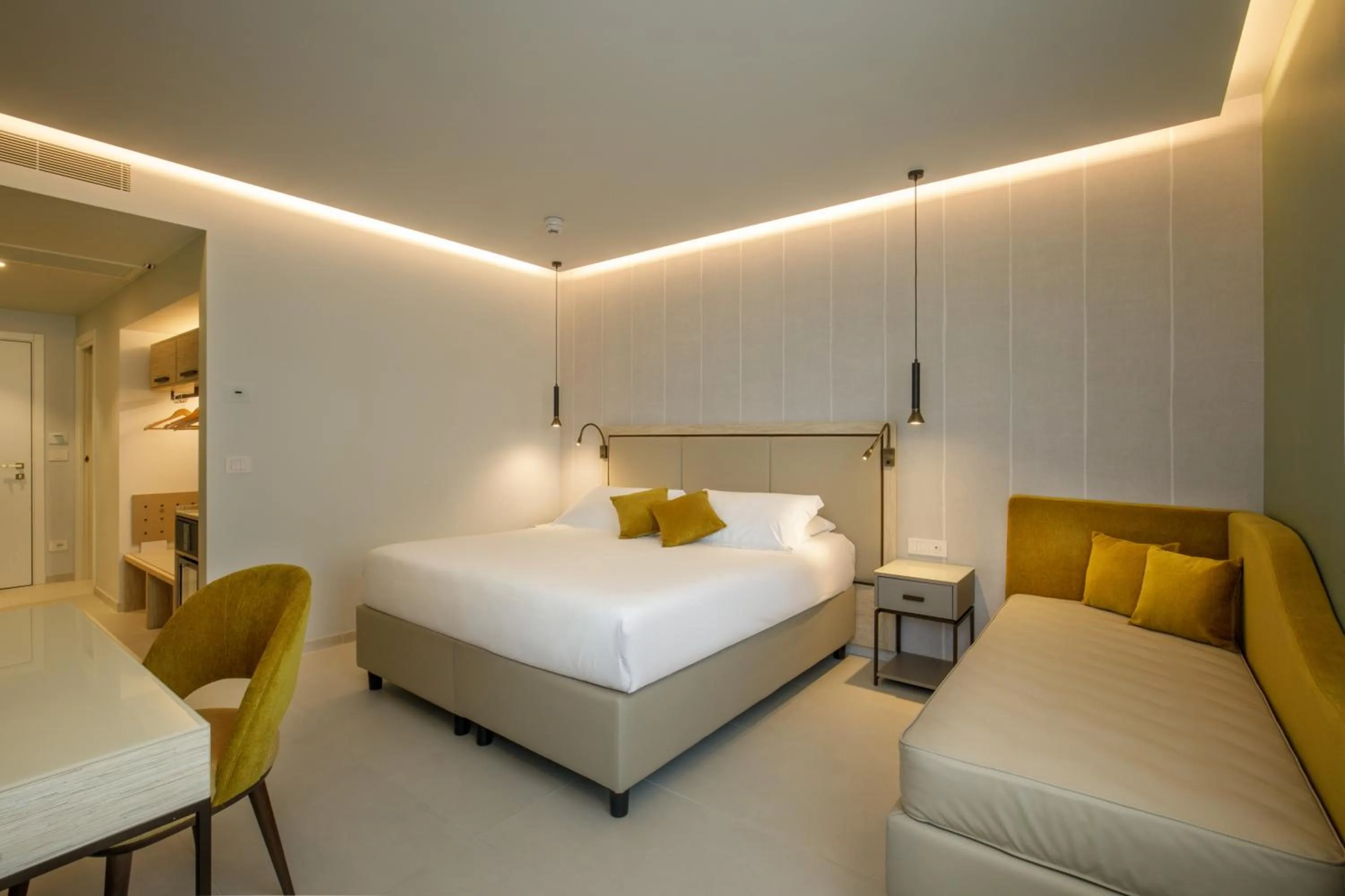 Bed in Ambasciatori Suite Hotel