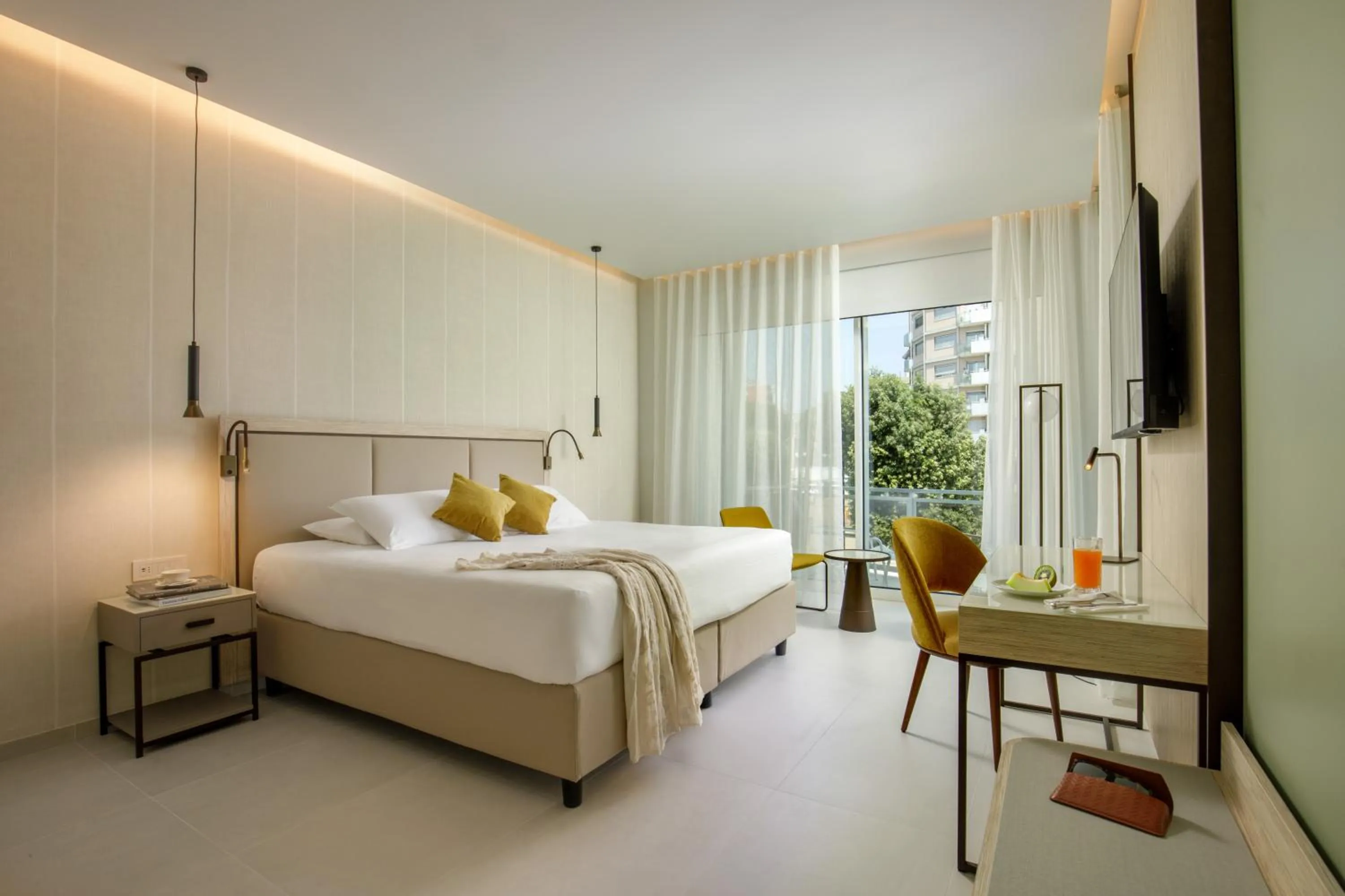 Bed in Ambasciatori Suite Hotel