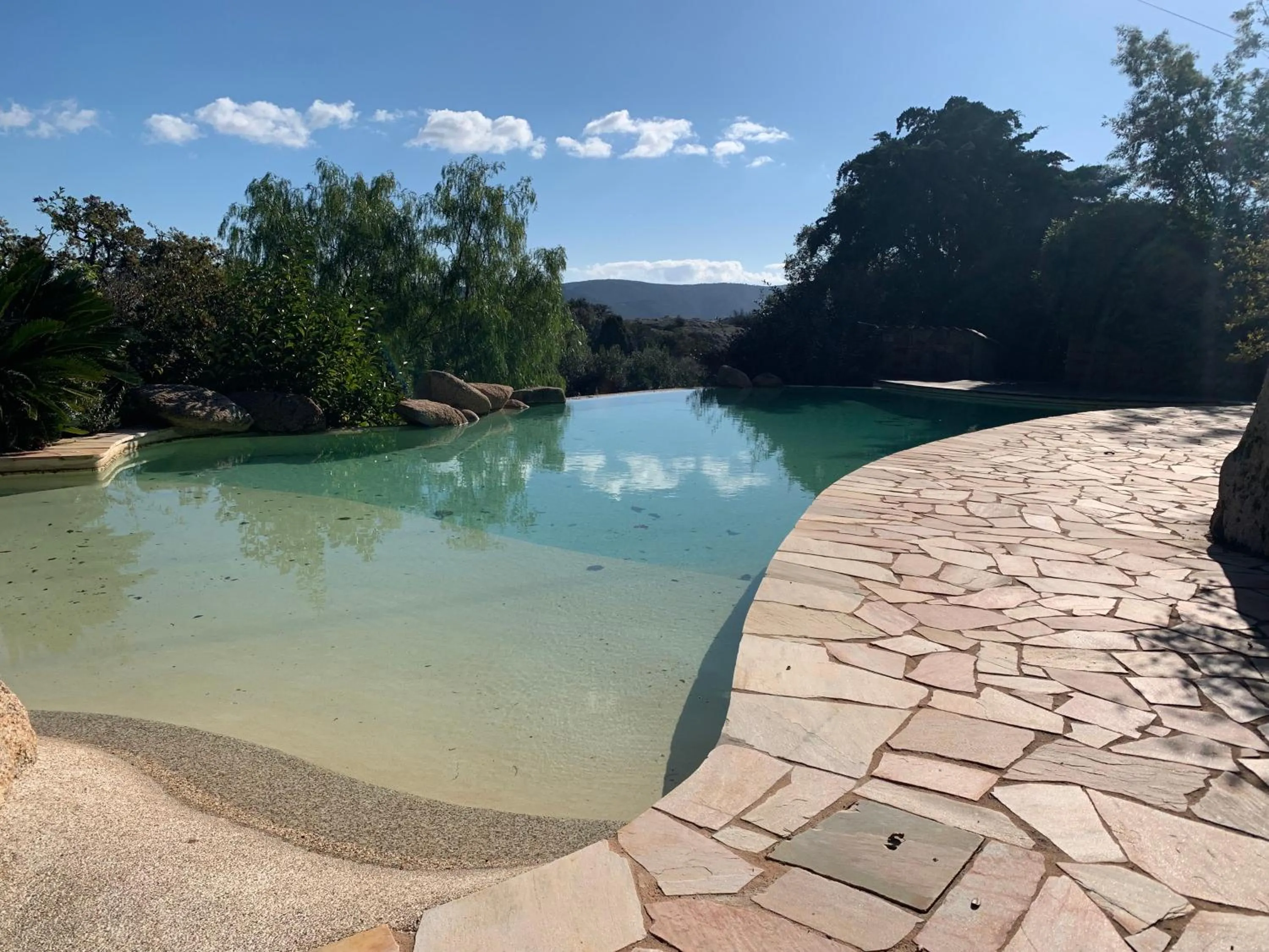 Swimming pool in La chambre d'Aphrodite avec jacuzzi vue mer