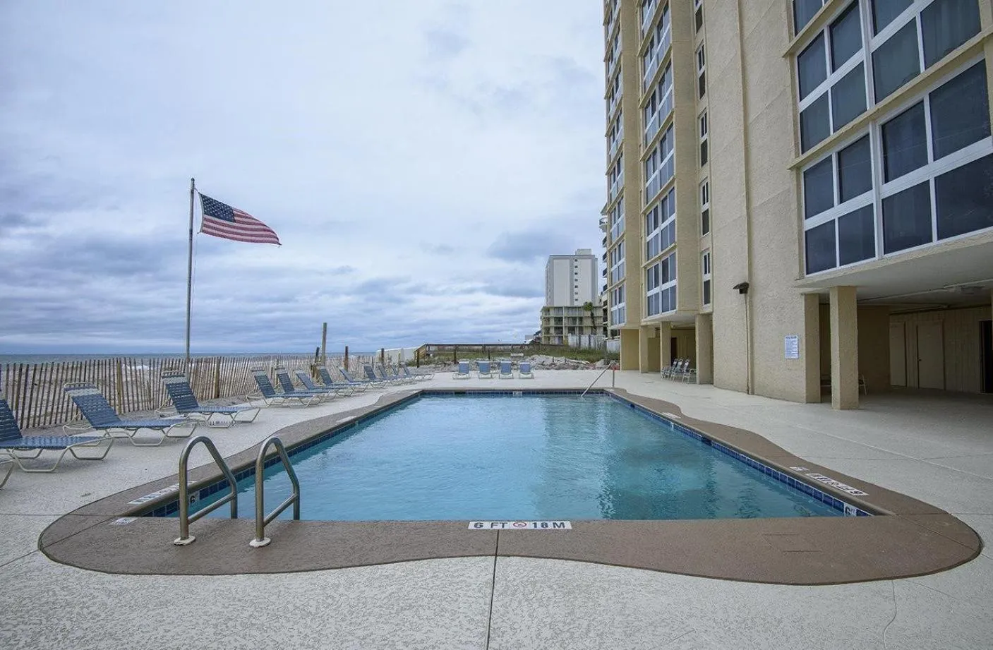 Swimming pool in Edgewater West 53 by ALBVR - This Beachfront Condo is Perfect for your next Family Getaway