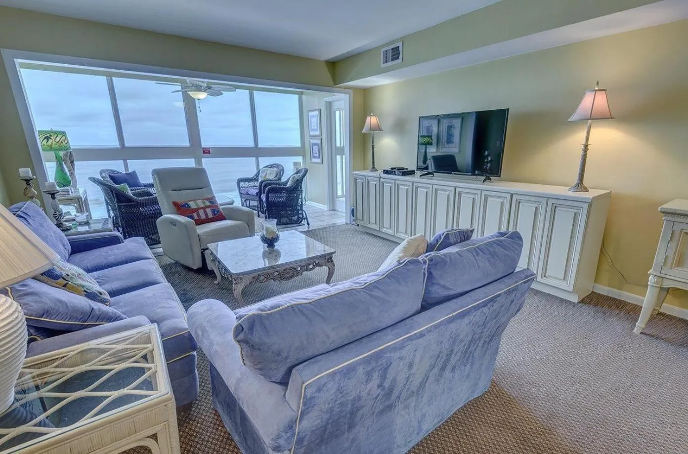 Living room in Edgewater West 53 by ALBVR - This Beachfront Condo is Perfect for your next Family Getaway