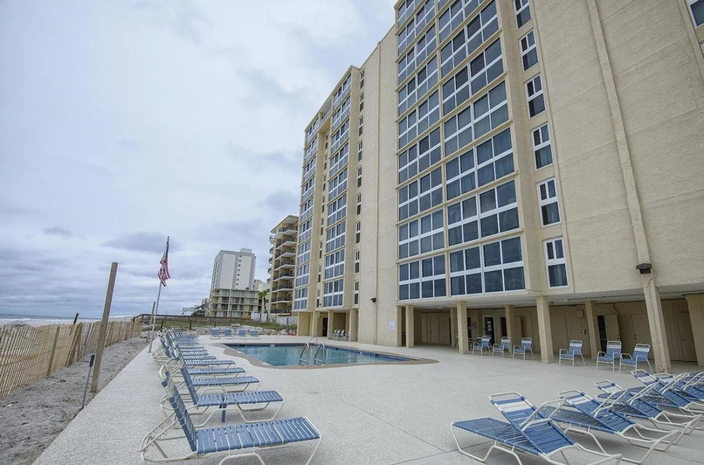 Swimming pool in Edgewater West 53 by ALBVR - This Beachfront Condo is Perfect for your next Family Getaway