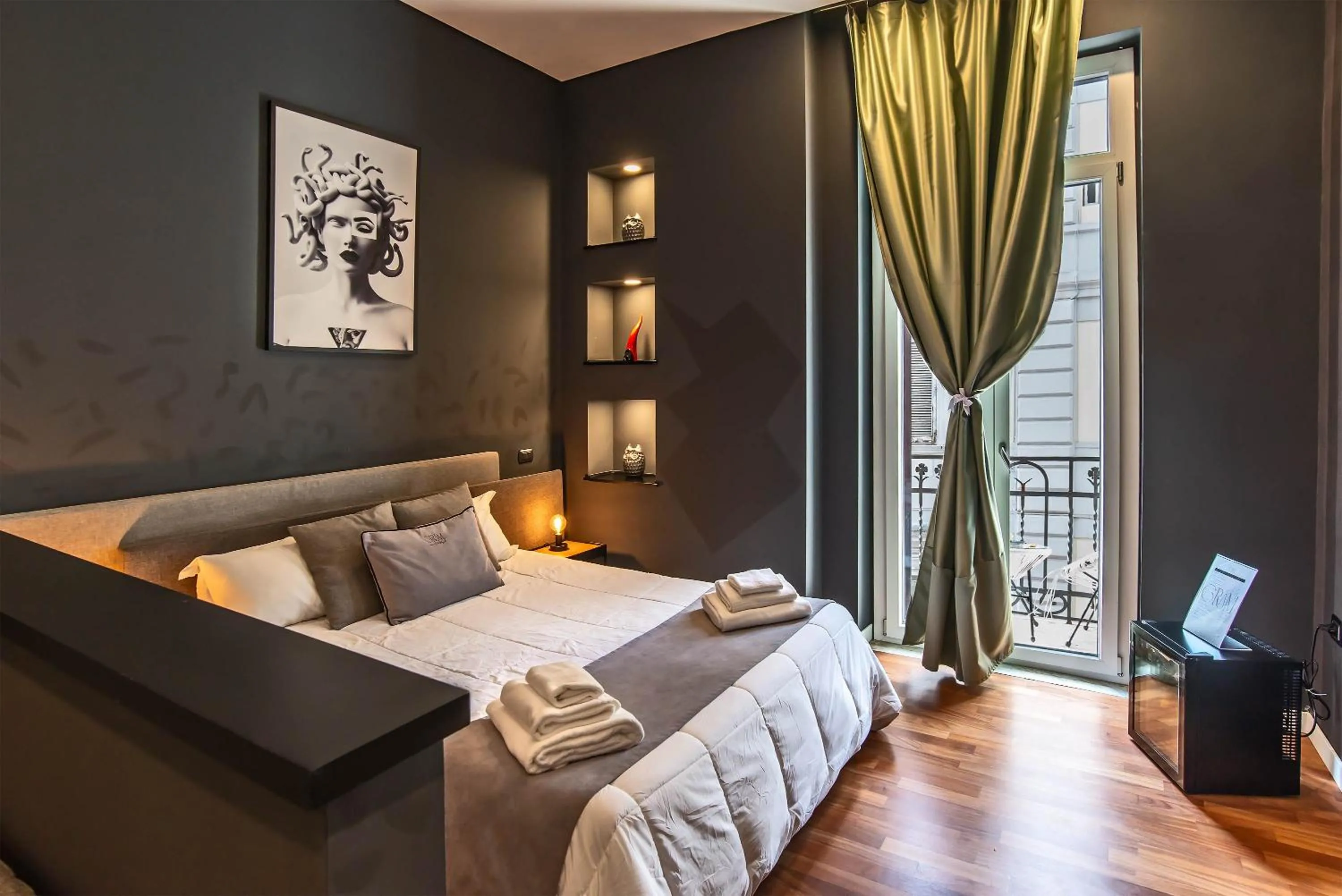 Photo of the whole room, Bed in Gram Suites