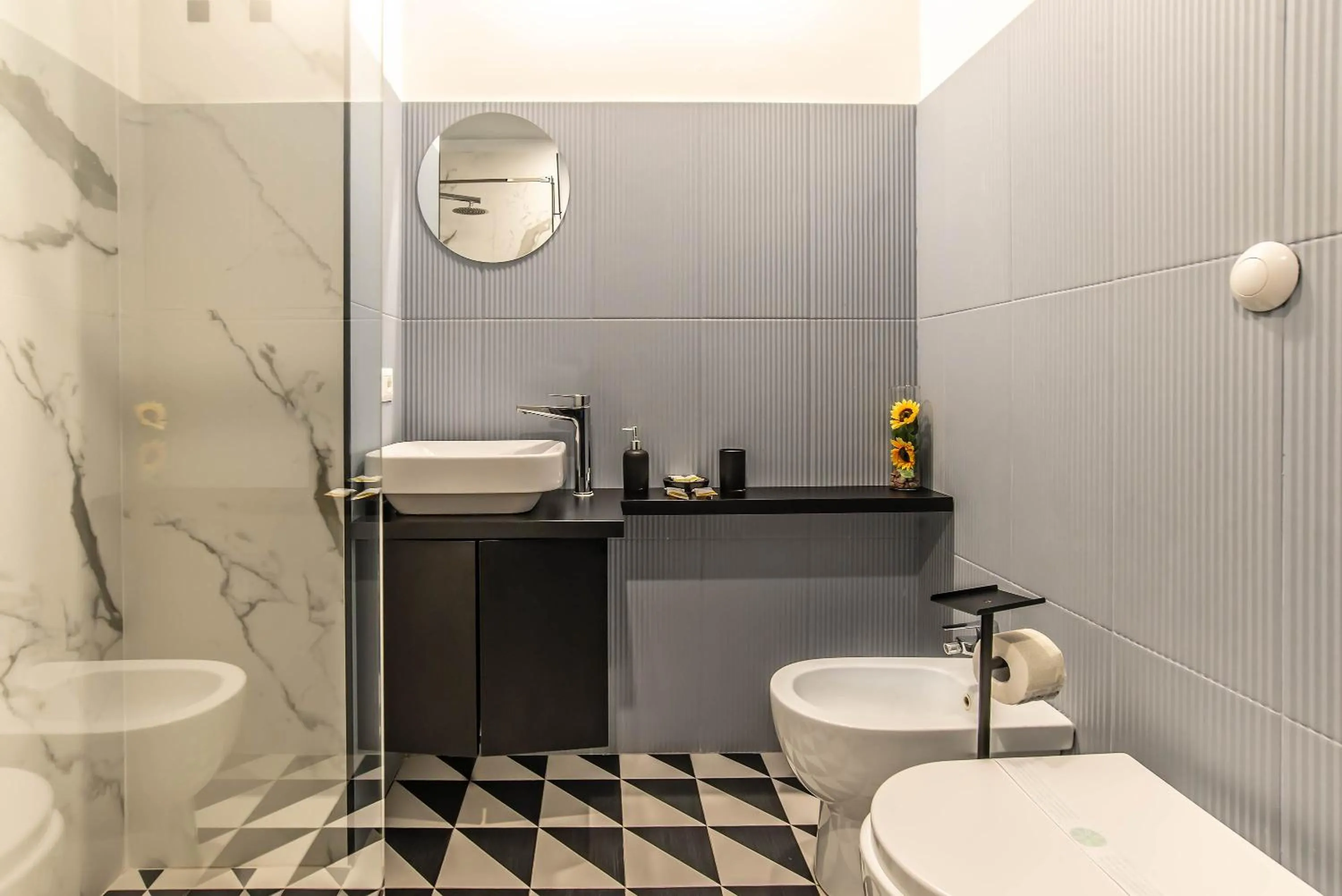 Shower in Gram Suites