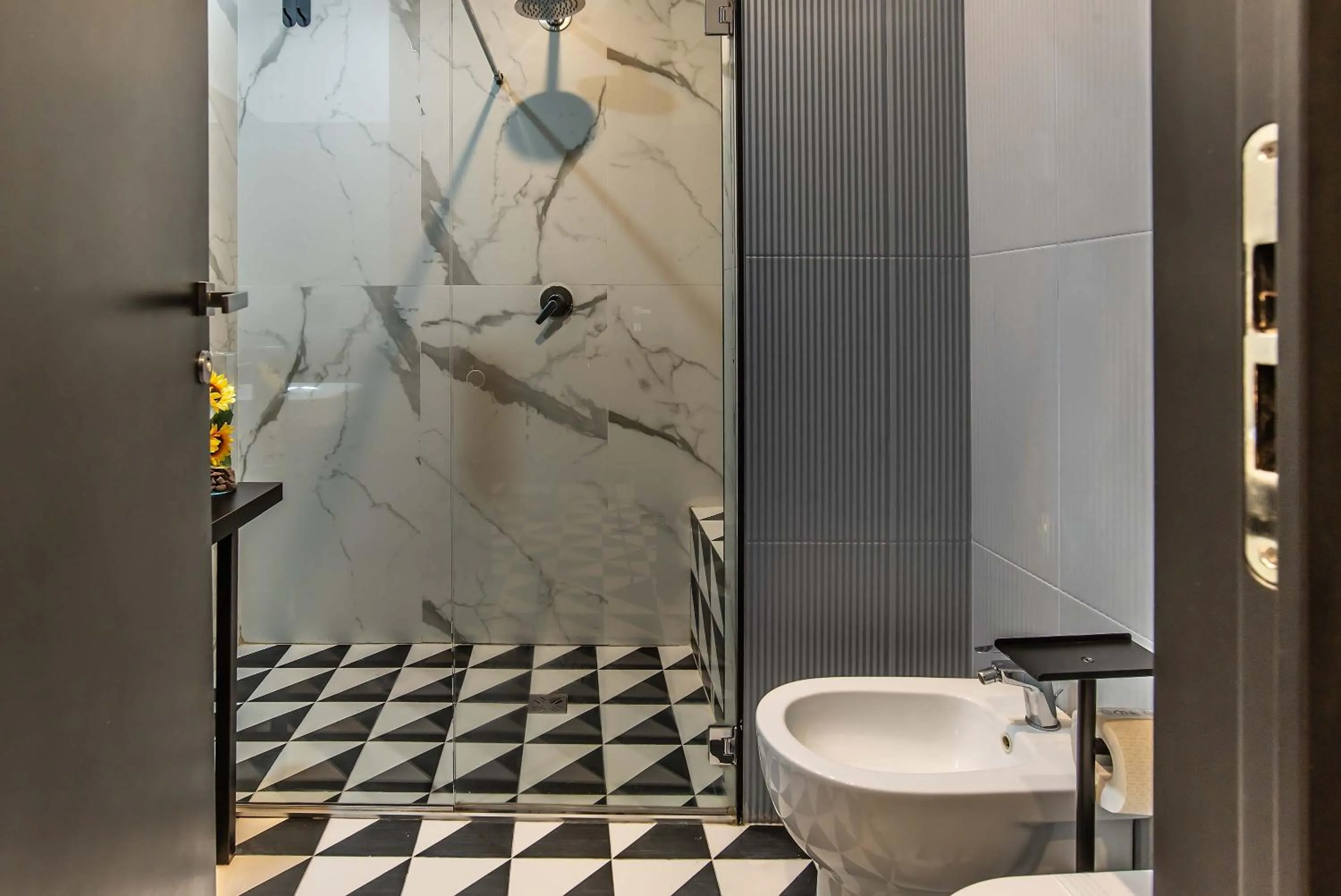 Shower in Gram Suites