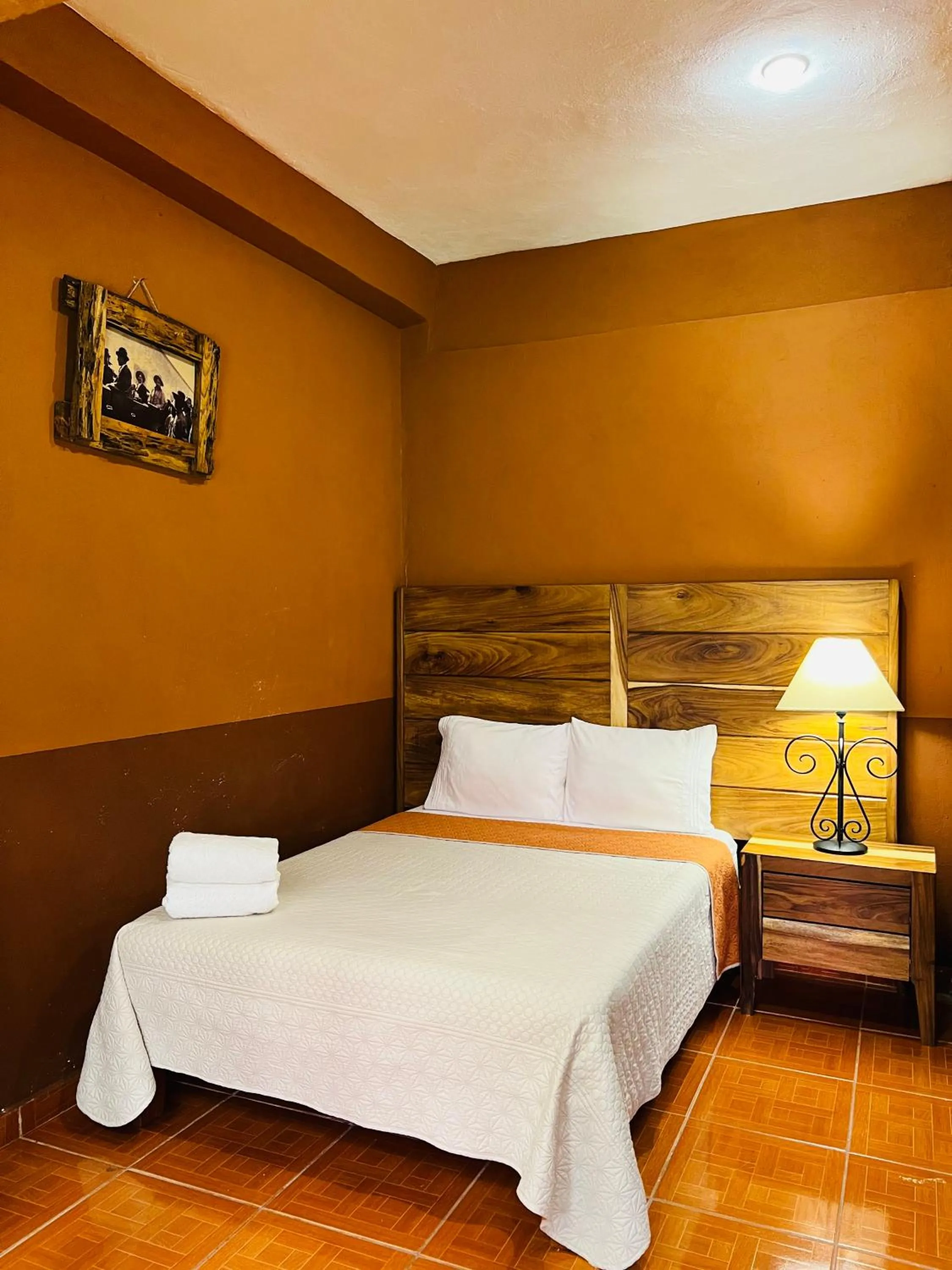 Bed in Hostería Casa Marquez