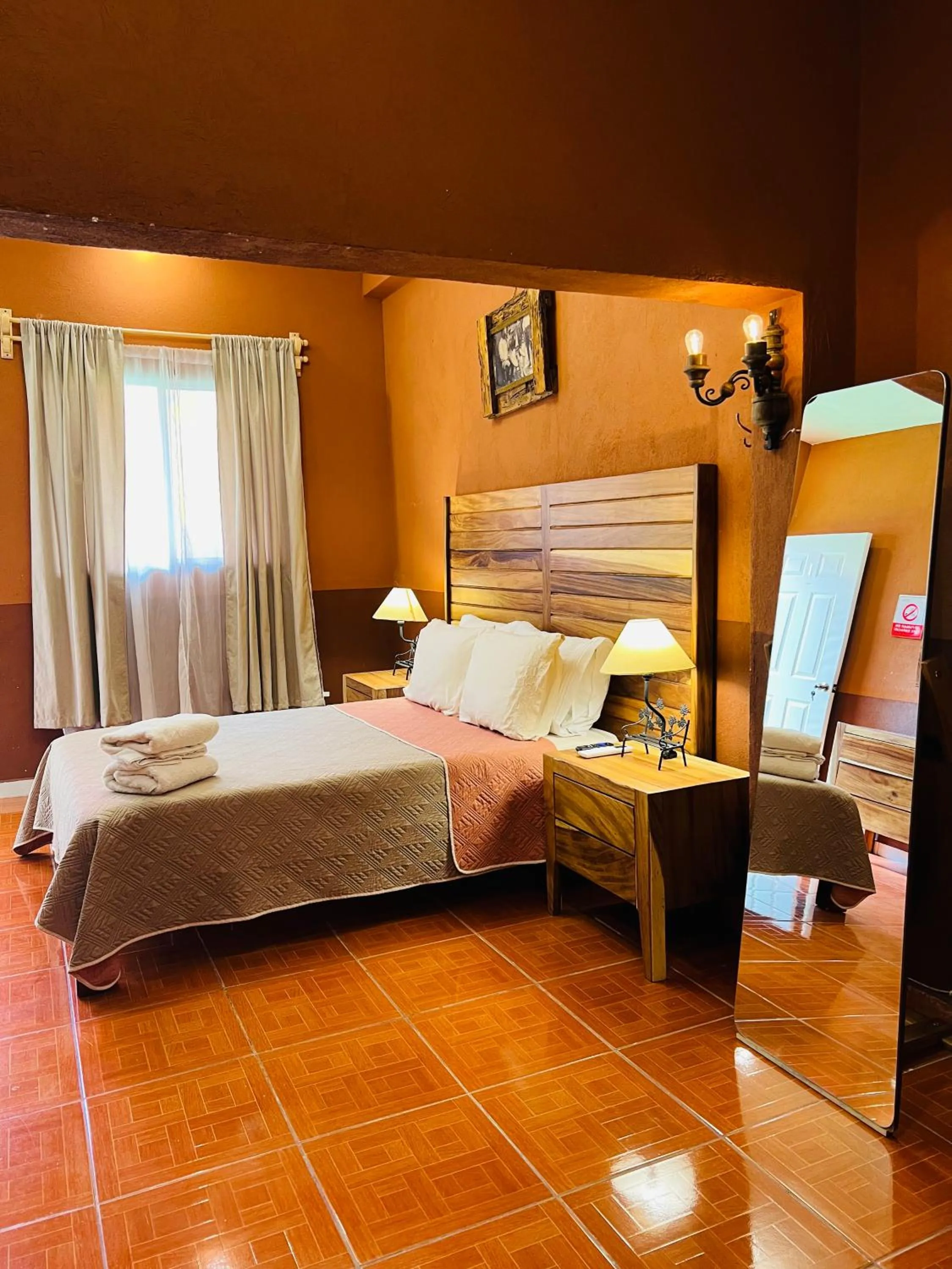 Bed in Hostería Casa Marquez