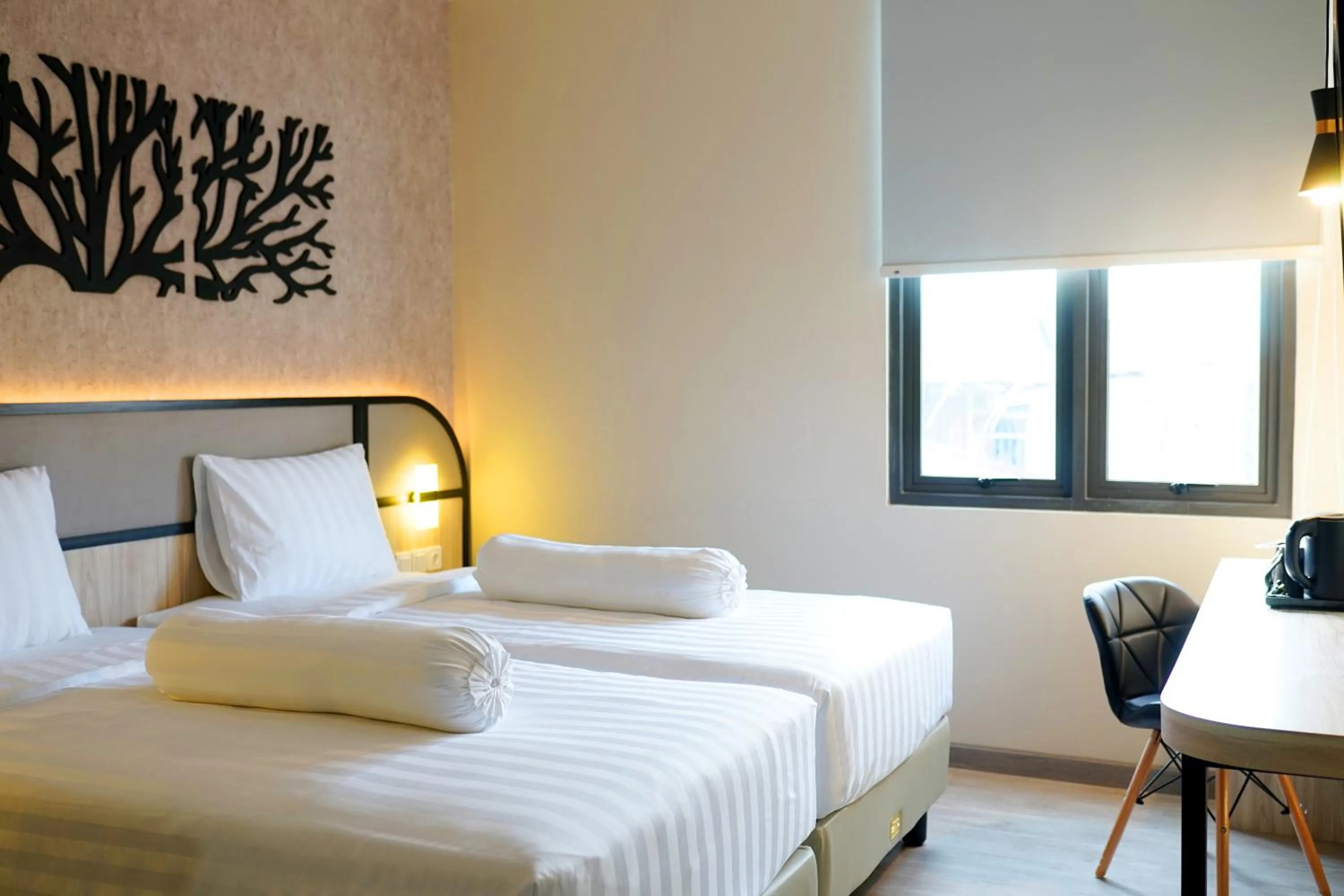 Bed in Front One Gosyen Hotel Salatiga