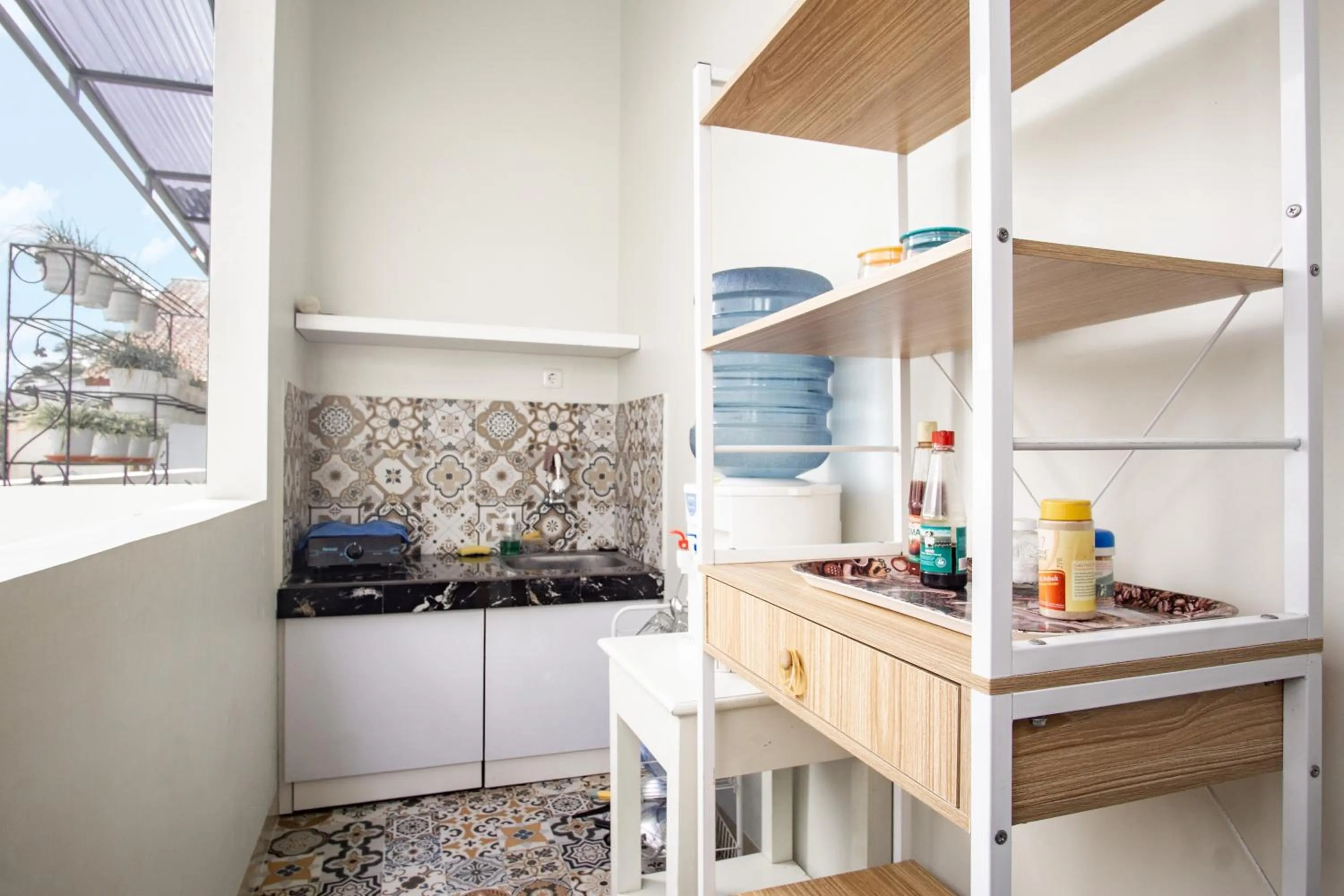 Kitchen or kitchenette in Bisma Balcony Homestay