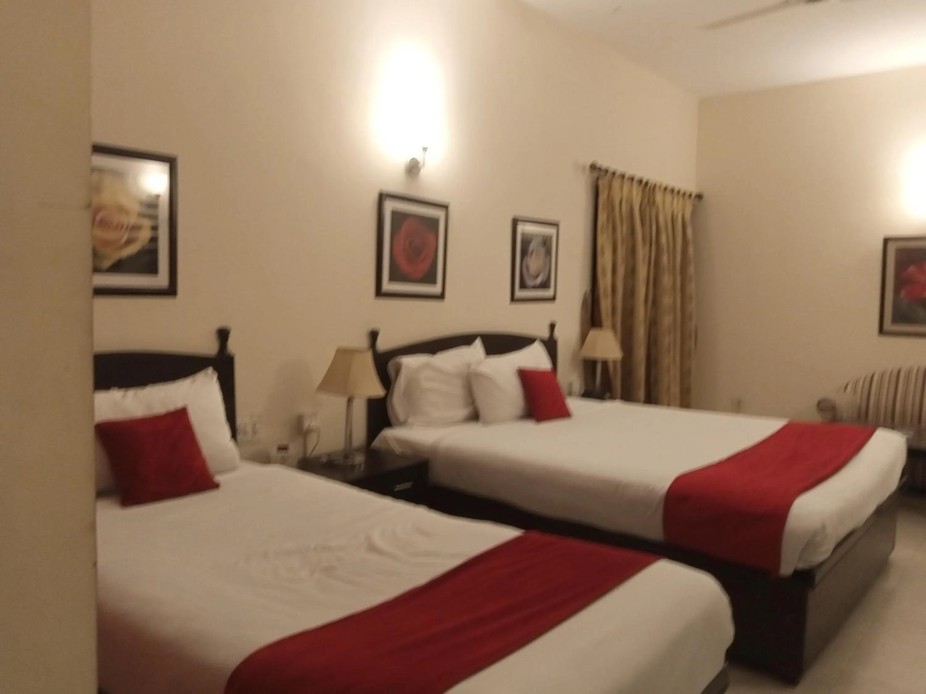 Photo of the whole room, Bed in Herfa INN Hotel Lahore