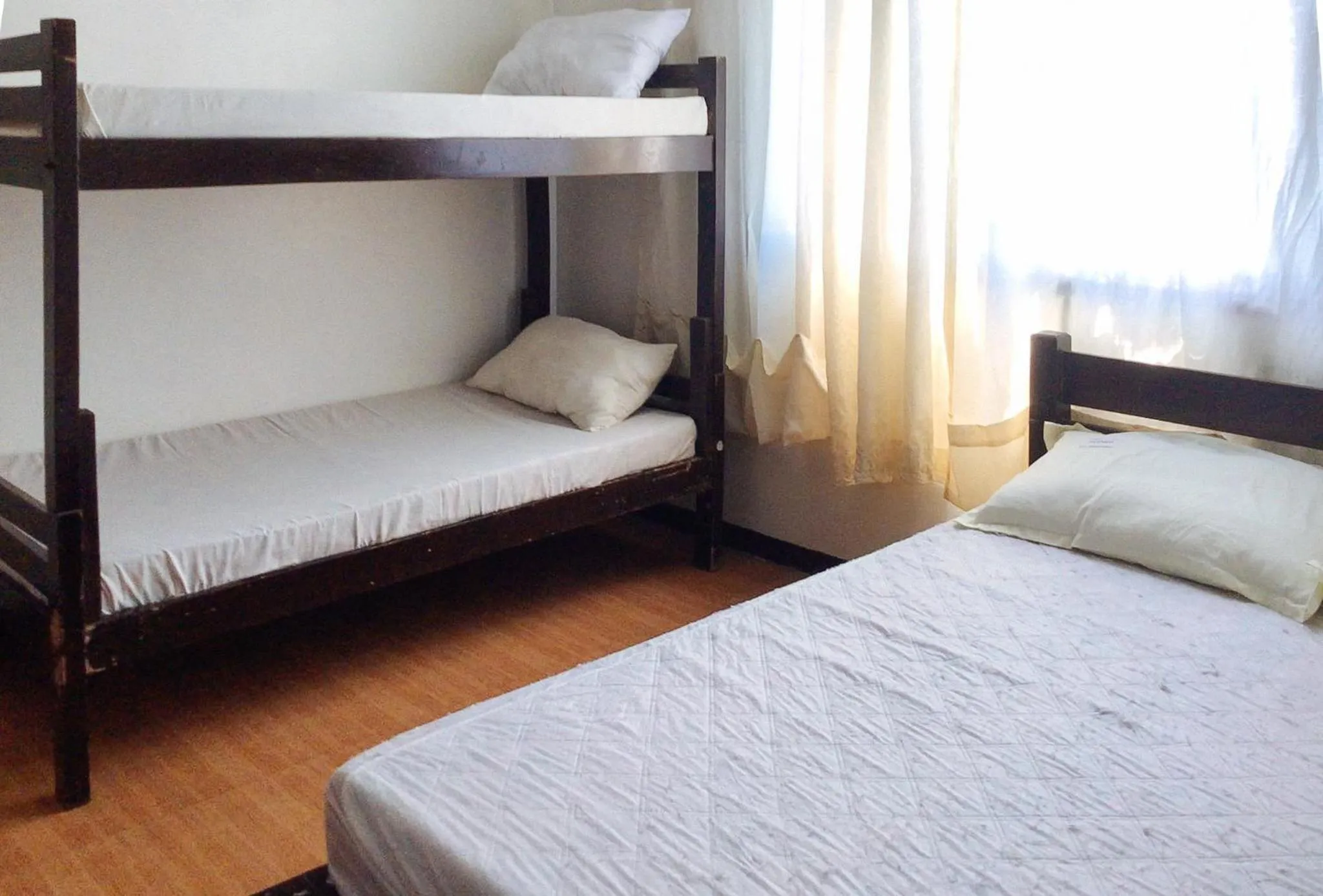 Bed in RedDoorz @ Nena's Hotel Dagupan City