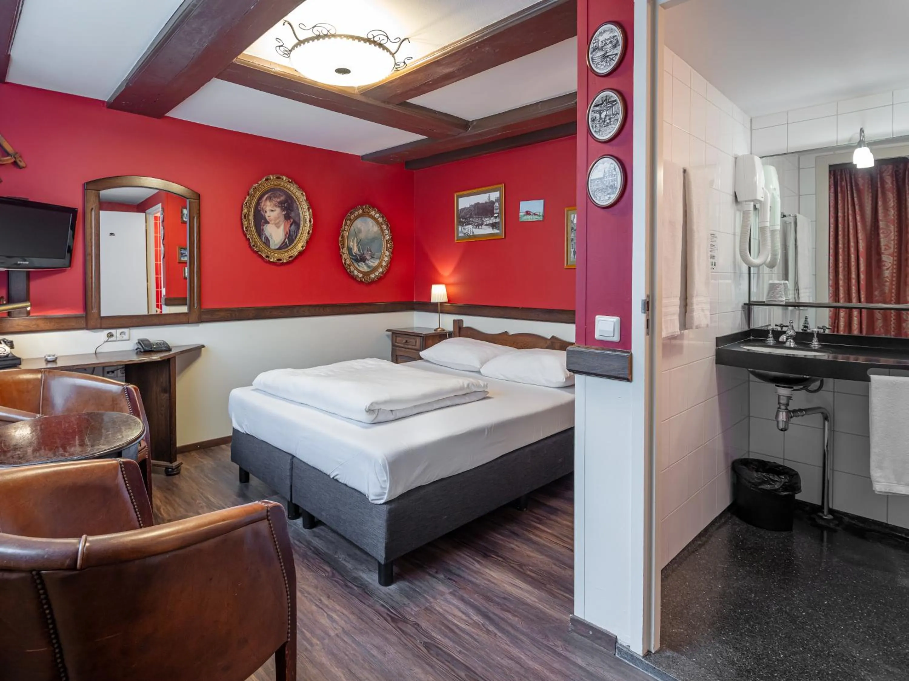 Bed in A-Train Hotel