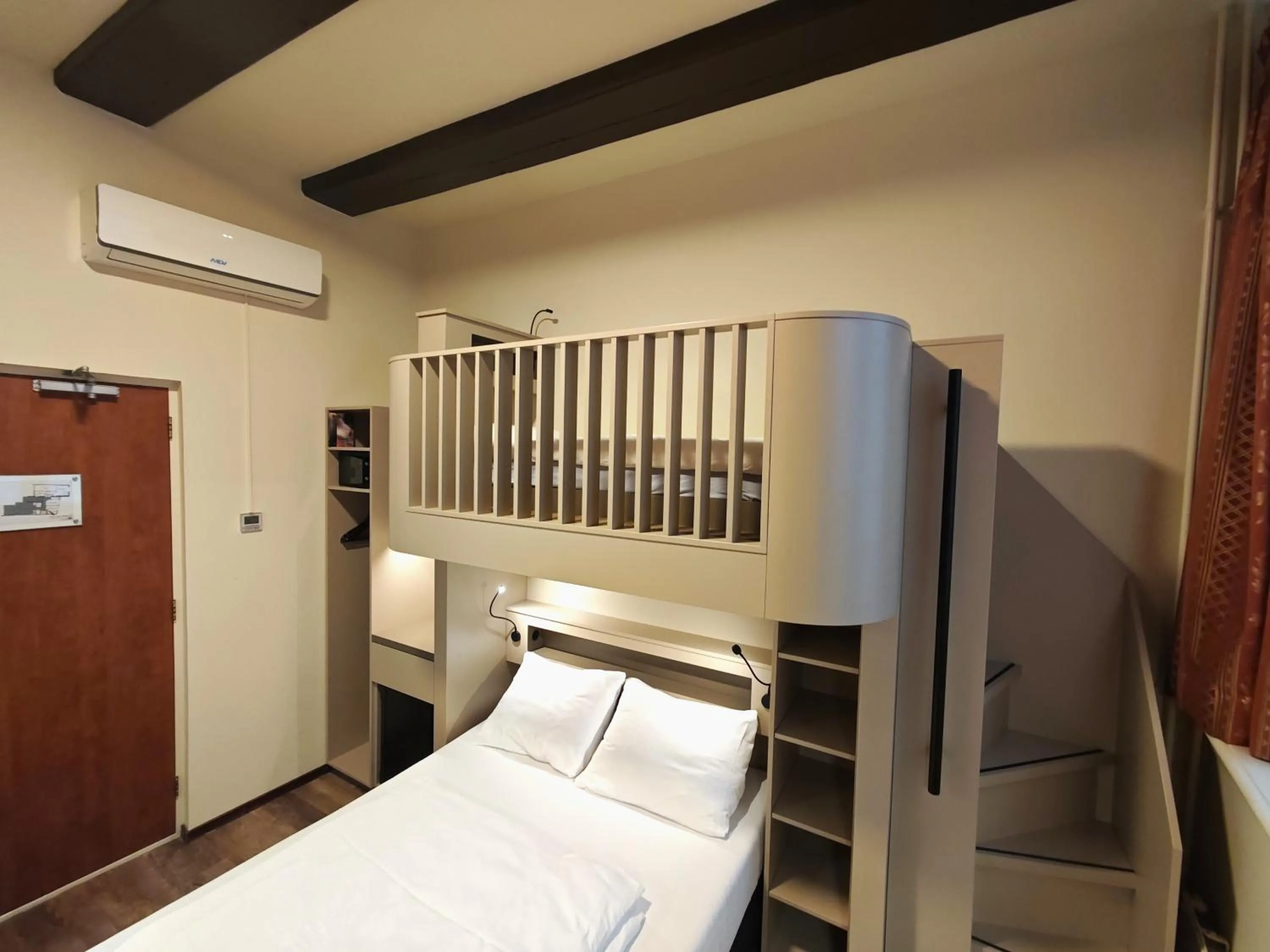 Photo of the whole room, Bed in A-Train Hotel