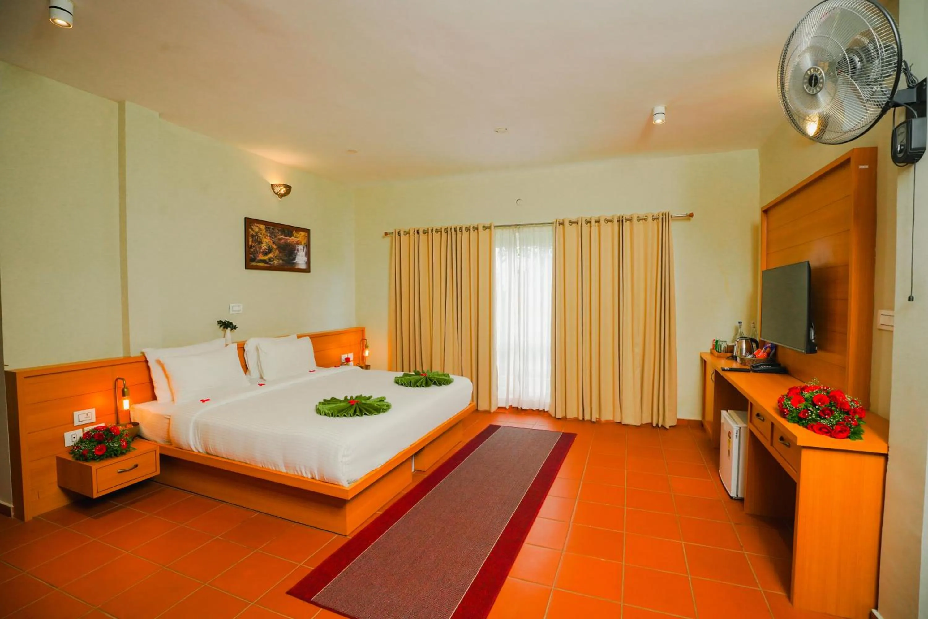 Bed in Vaidekam Resorts & Wellness, Kannur