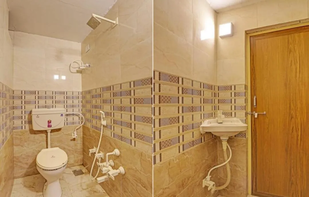 Toilet in Hotel Alexa - Satellite Prahladnagar, Ahmedabad