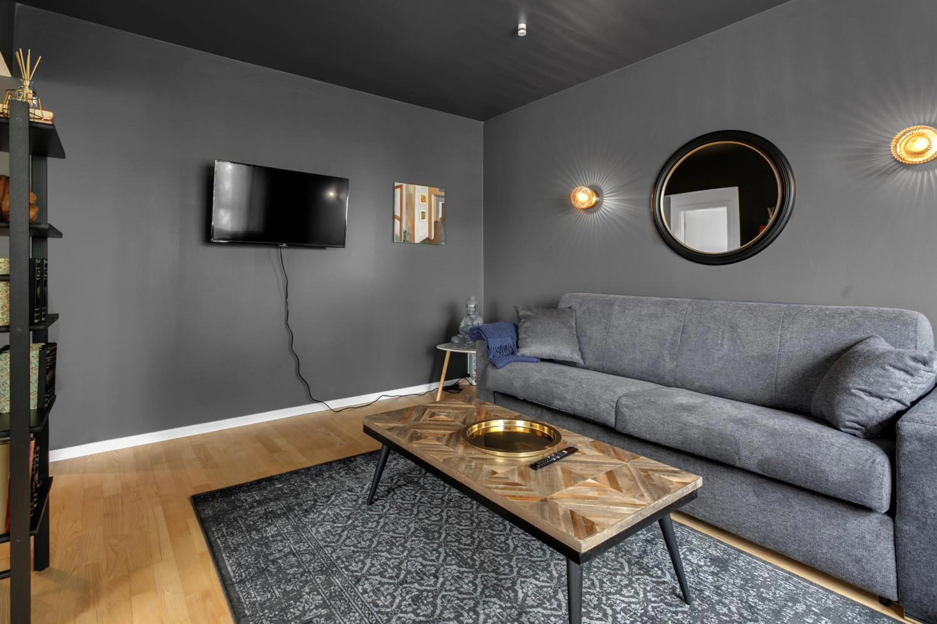 TV and multimedia in Cozy 2BR Apartment