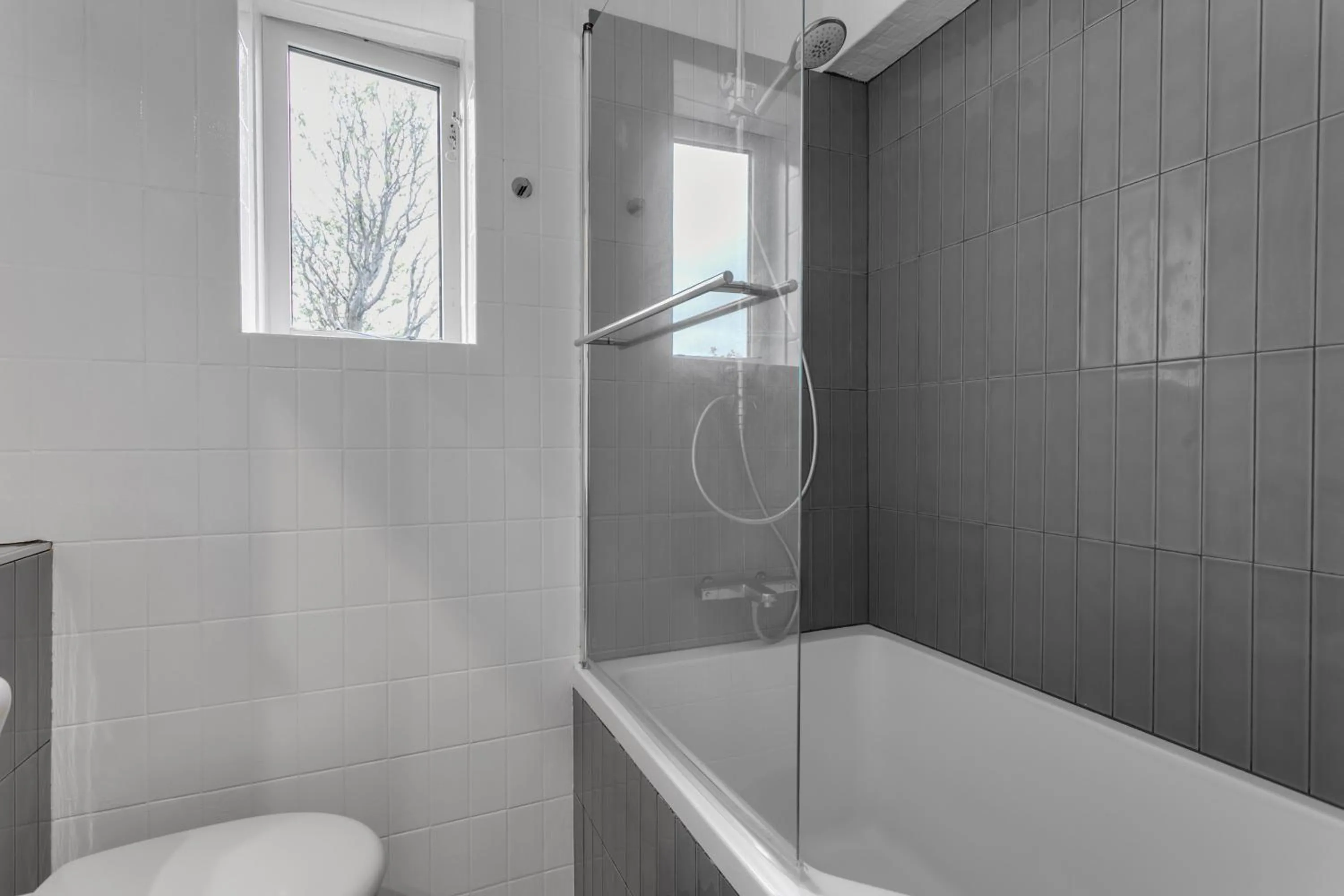 Bathroom in Cozy 2BR Apartment